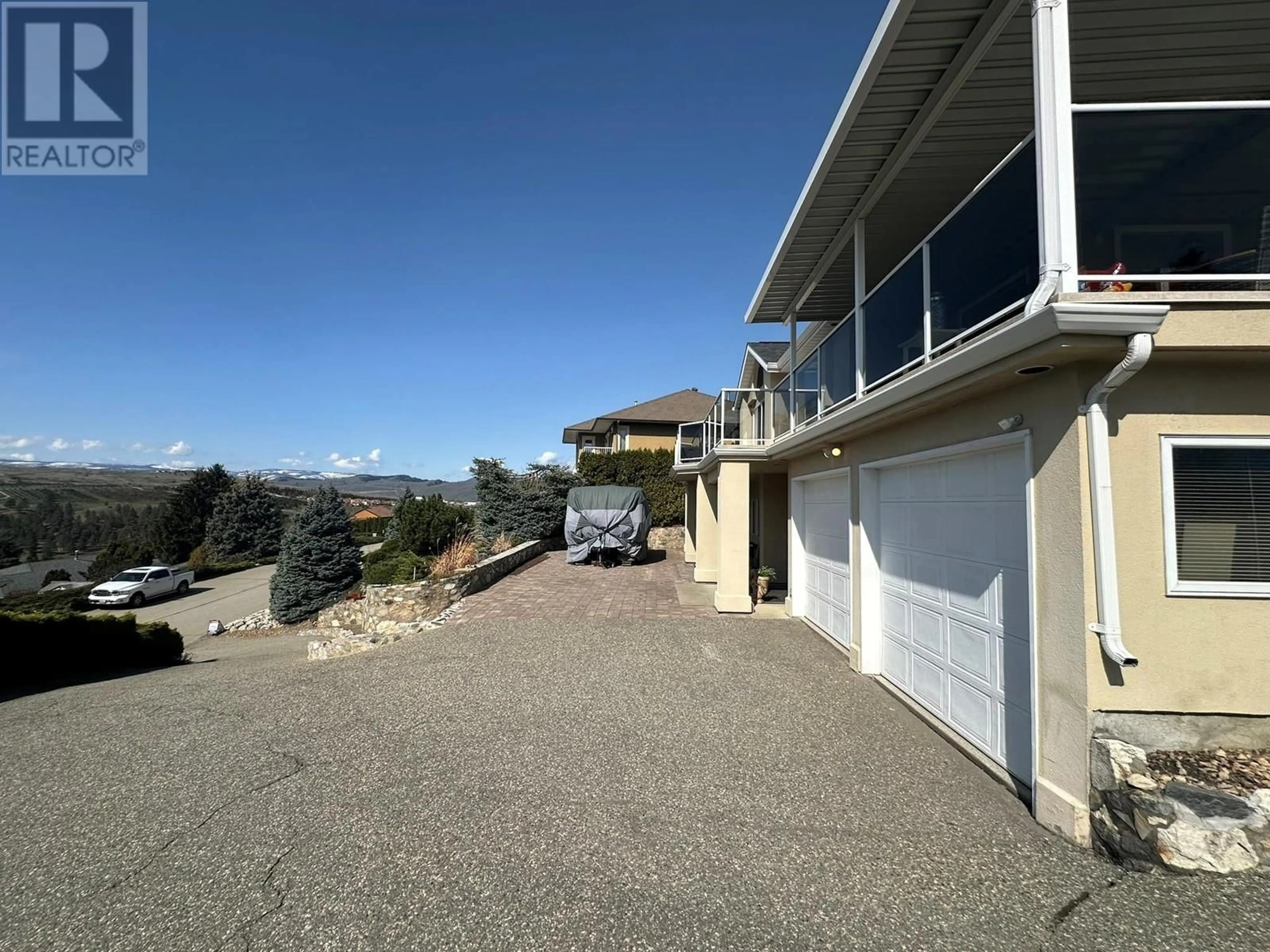 A pic from outside/outdoor area/front of a property/back of a property/a pic from drone, mountain view for 9209 ORCHARD RIDGE DRIVE, Coldstream British Columbia V1B1V8