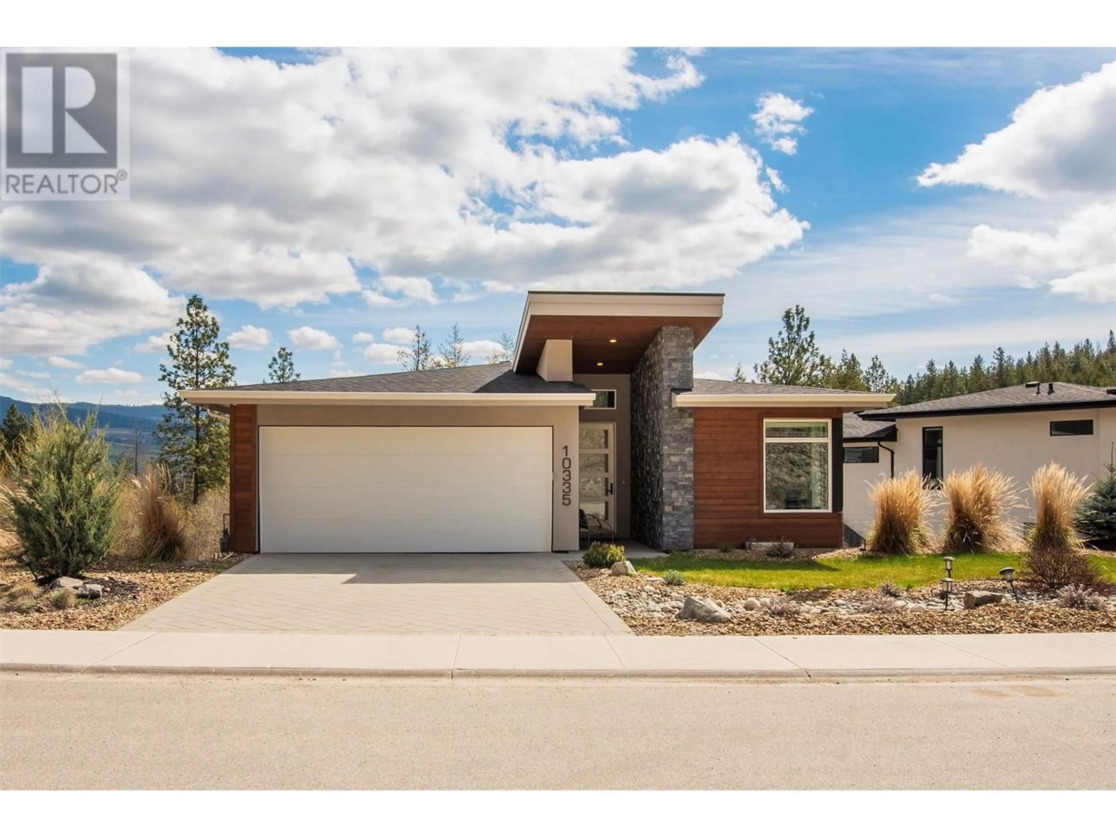 Home with brick exterior material, street for 10335 LONG ROAD, Lake Country British Columbia V4V0A9