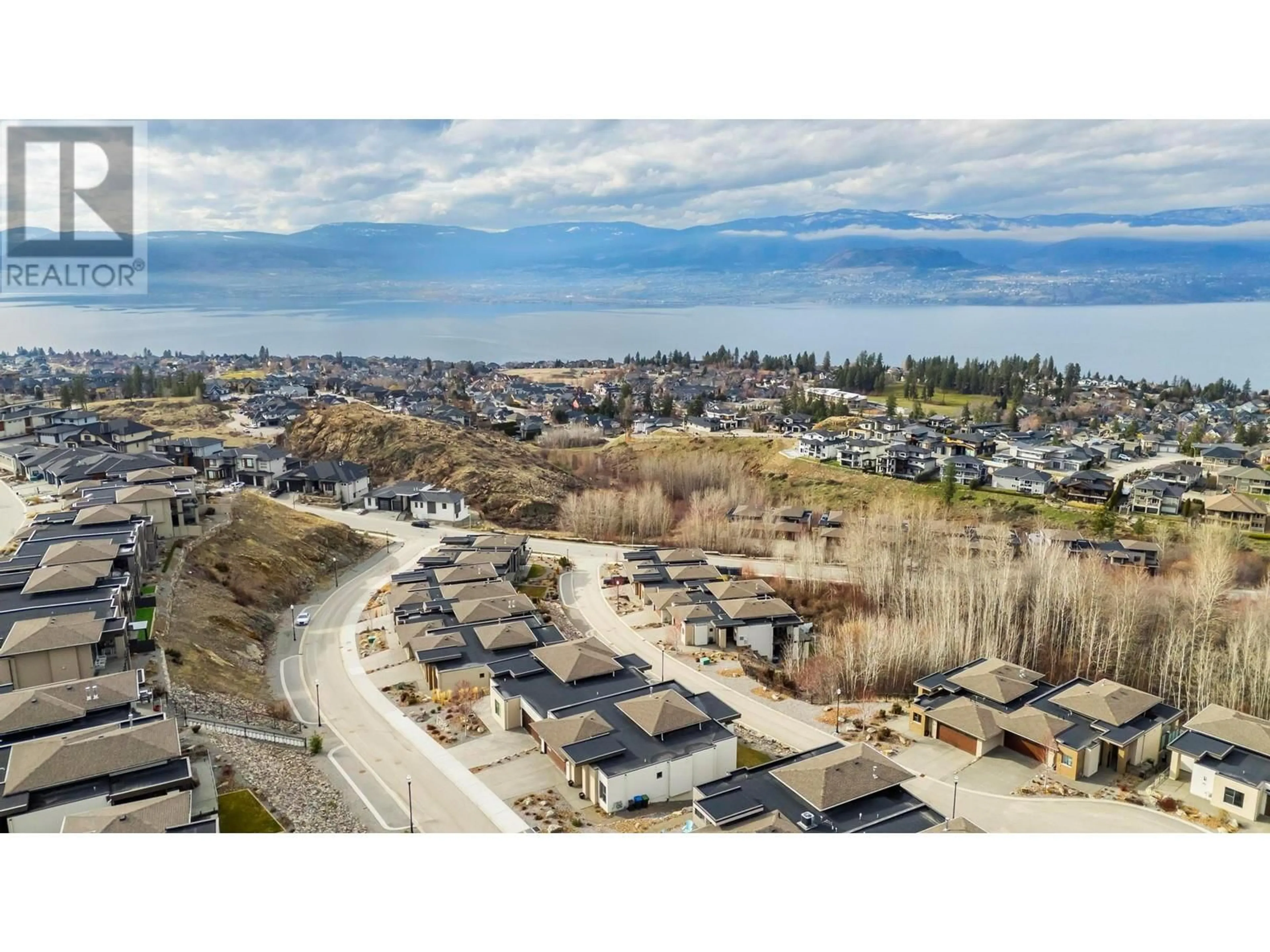 A pic from outside/outdoor area/front of a property/back of a property/a pic from drone, mountain view for 468 SPARROW HAWK COURT, Kelowna British Columbia V1W0A6