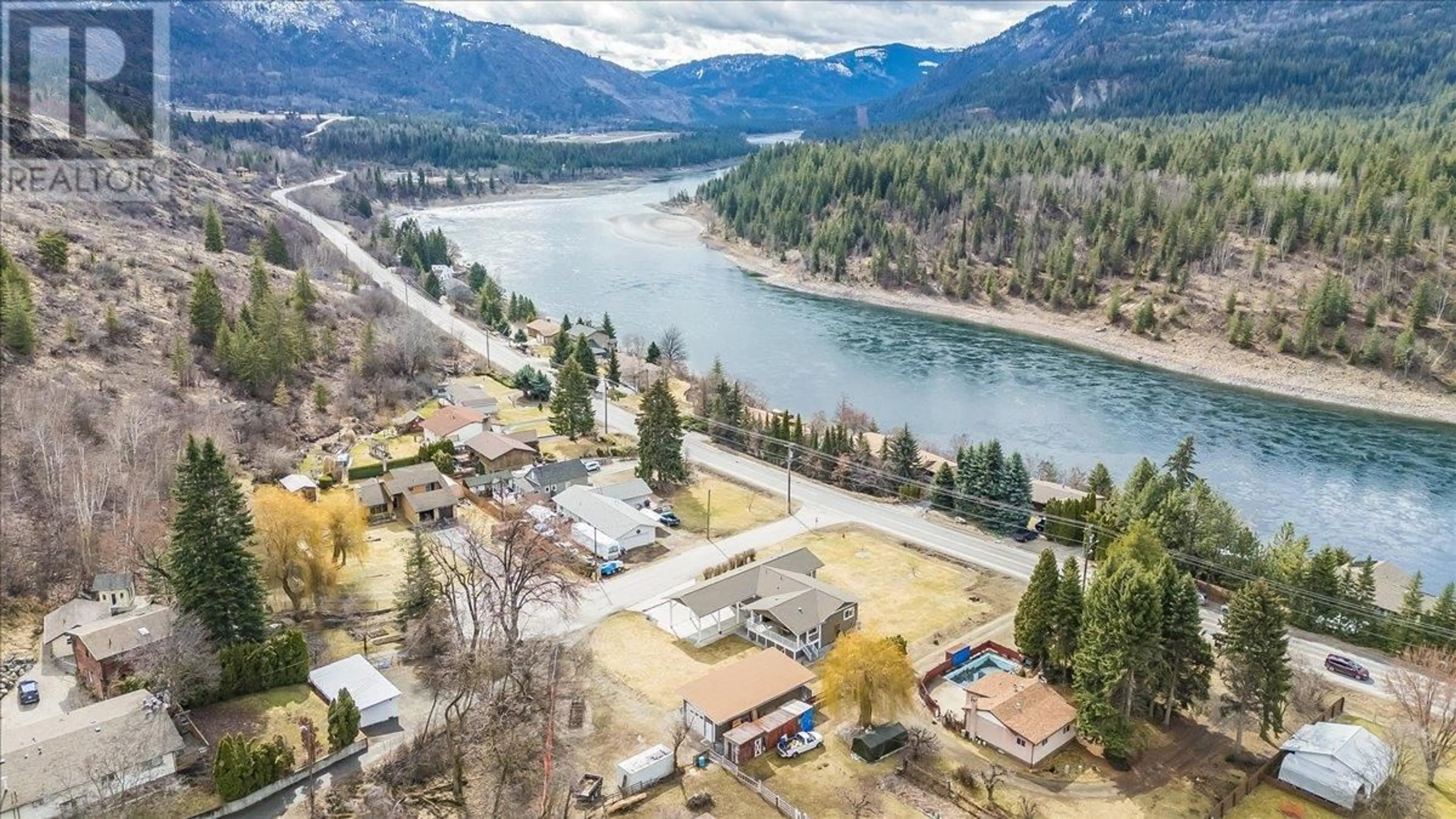 A pic from outside/outdoor area/front of a property/back of a property/a pic from drone, water/lake/river/ocean view for 8480 HIGHWAY 22A OTHER, Trail British Columbia V1R4W8