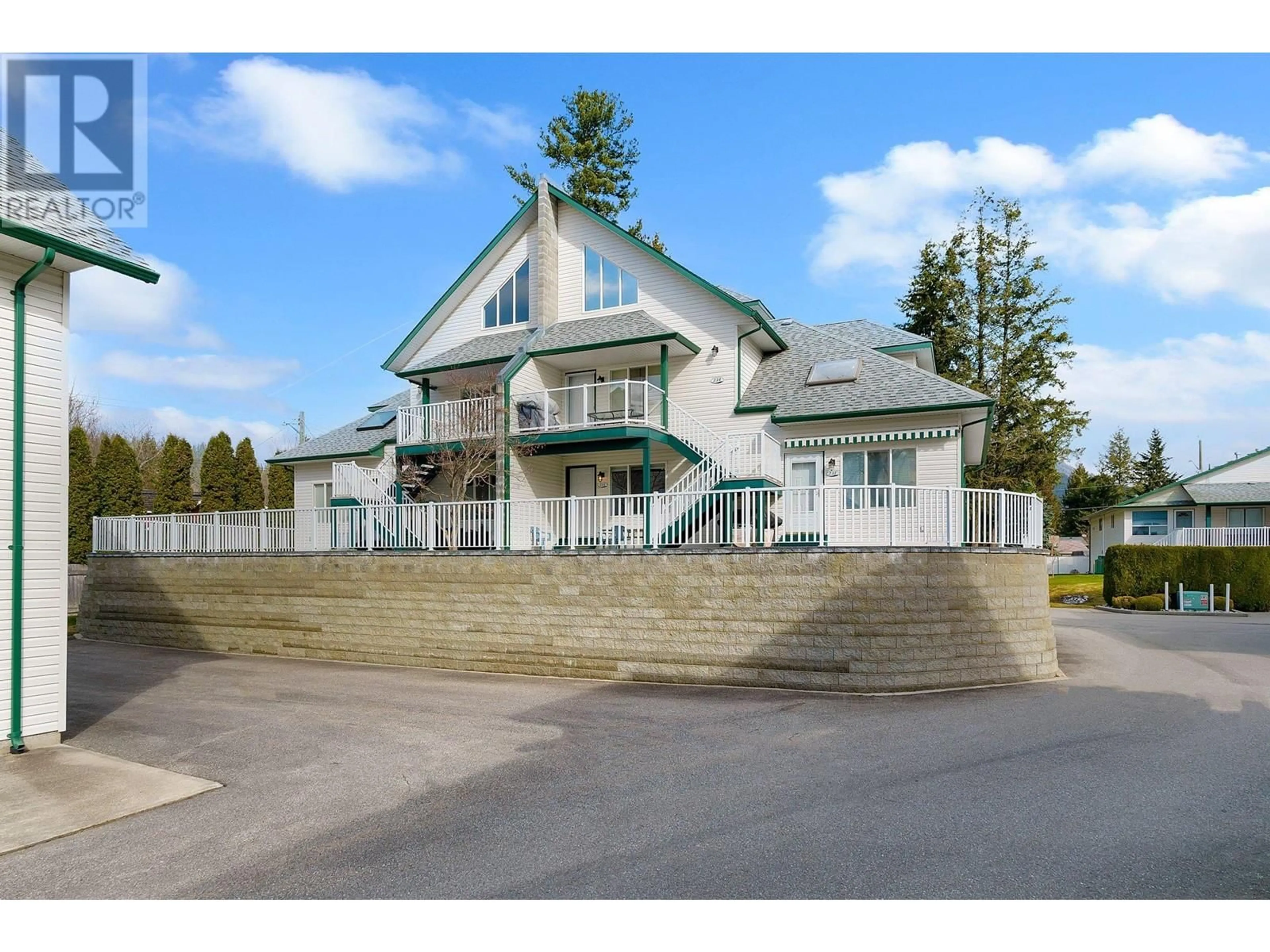 A pic from outside/outdoor area/front of a property/back of a property/a pic from drone, unknown for 231 - 213 WHITE PINE CRESCENT, Sicamous British Columbia V0E2V1