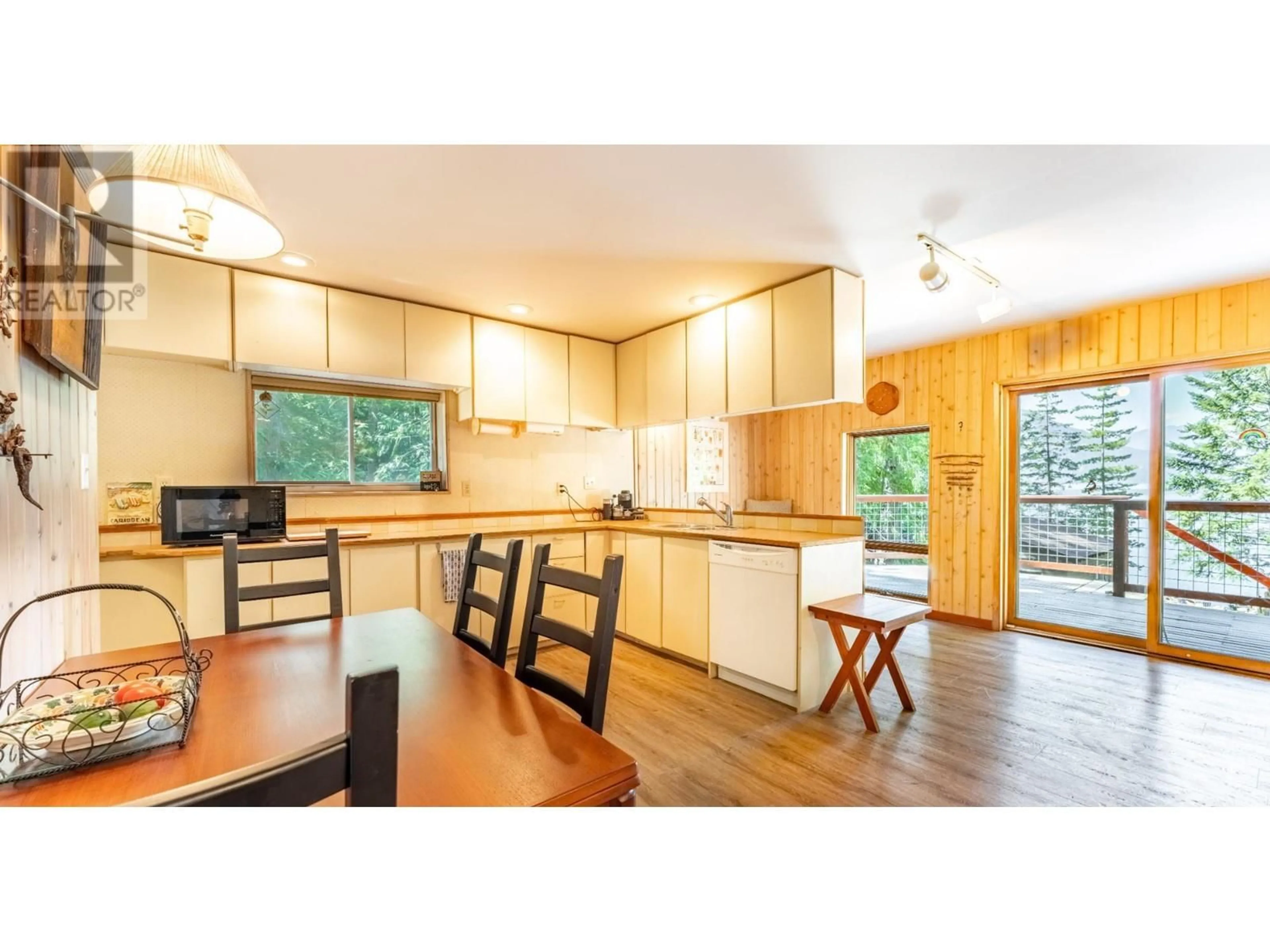 Open concept kitchen, wood/laminate floor for 13507 3A HIGHWAY, Boswell British Columbia V0B1A0