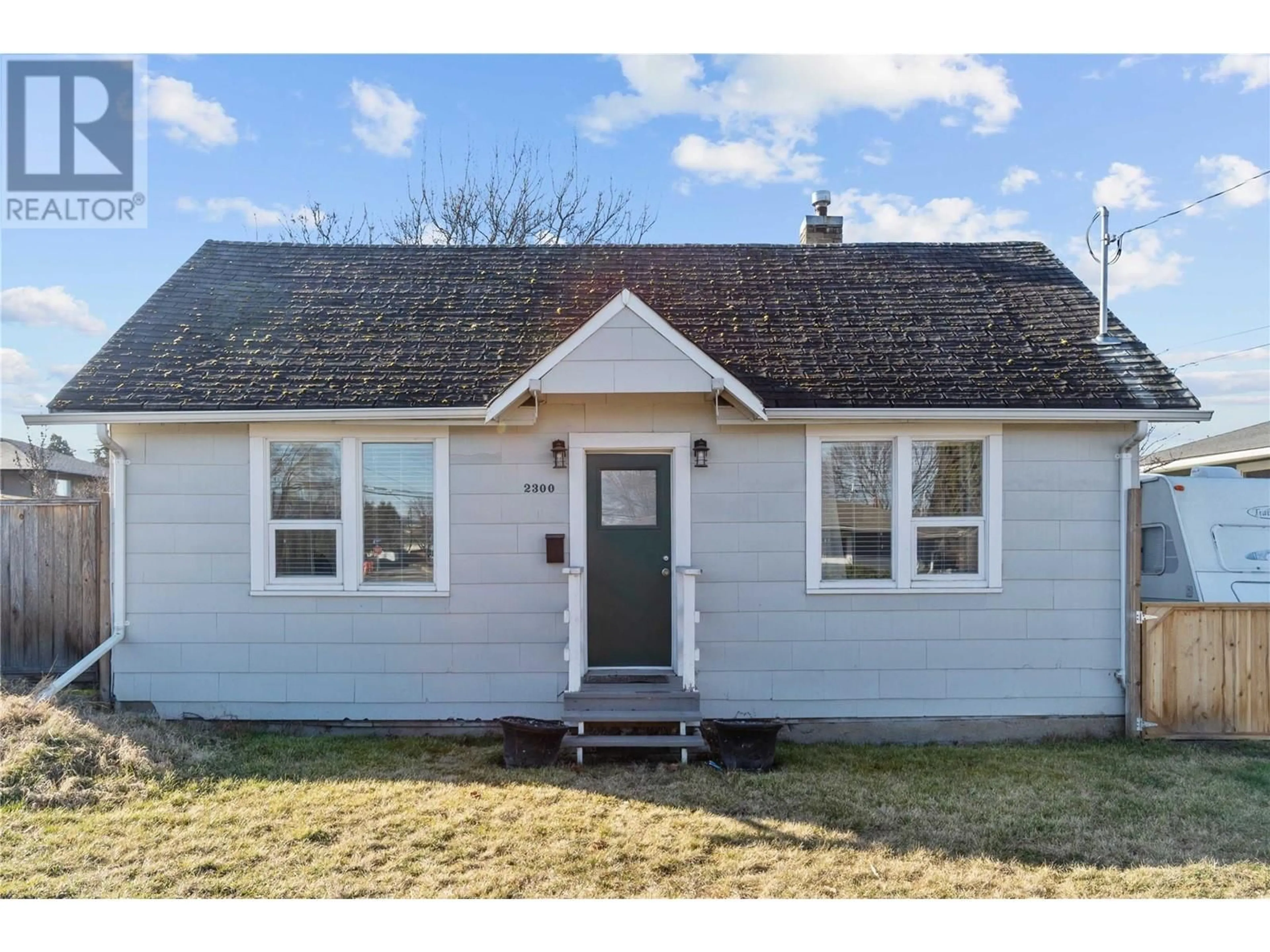 Home with vinyl exterior material, street for 2300 38 AVENUE, Vernon British Columbia V1T2Z4