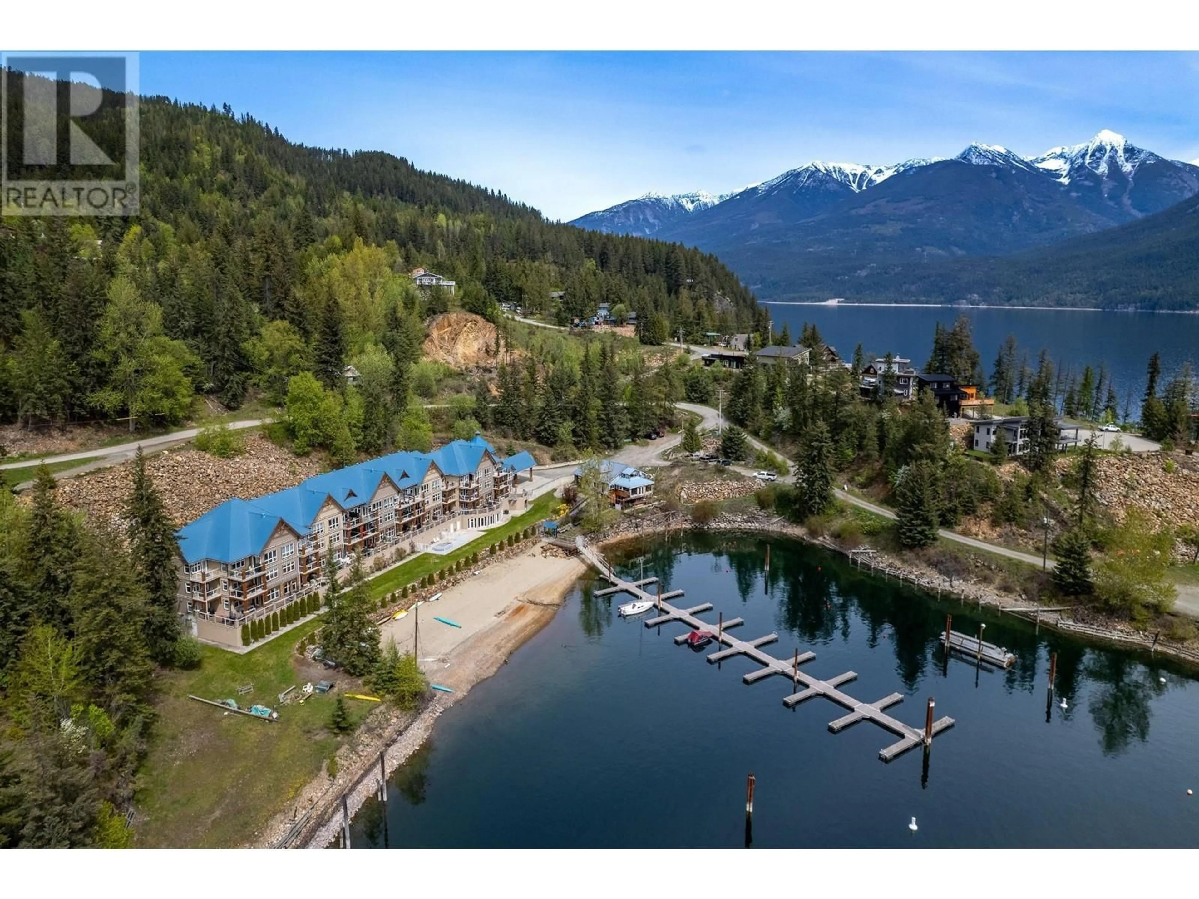 A pic from outside/outdoor area/front of a property/back of a property/a pic from drone, water/lake/river/ocean view for 305 - 550 RAINBOW DRIVE, Kaslo British Columbia V0G1M0