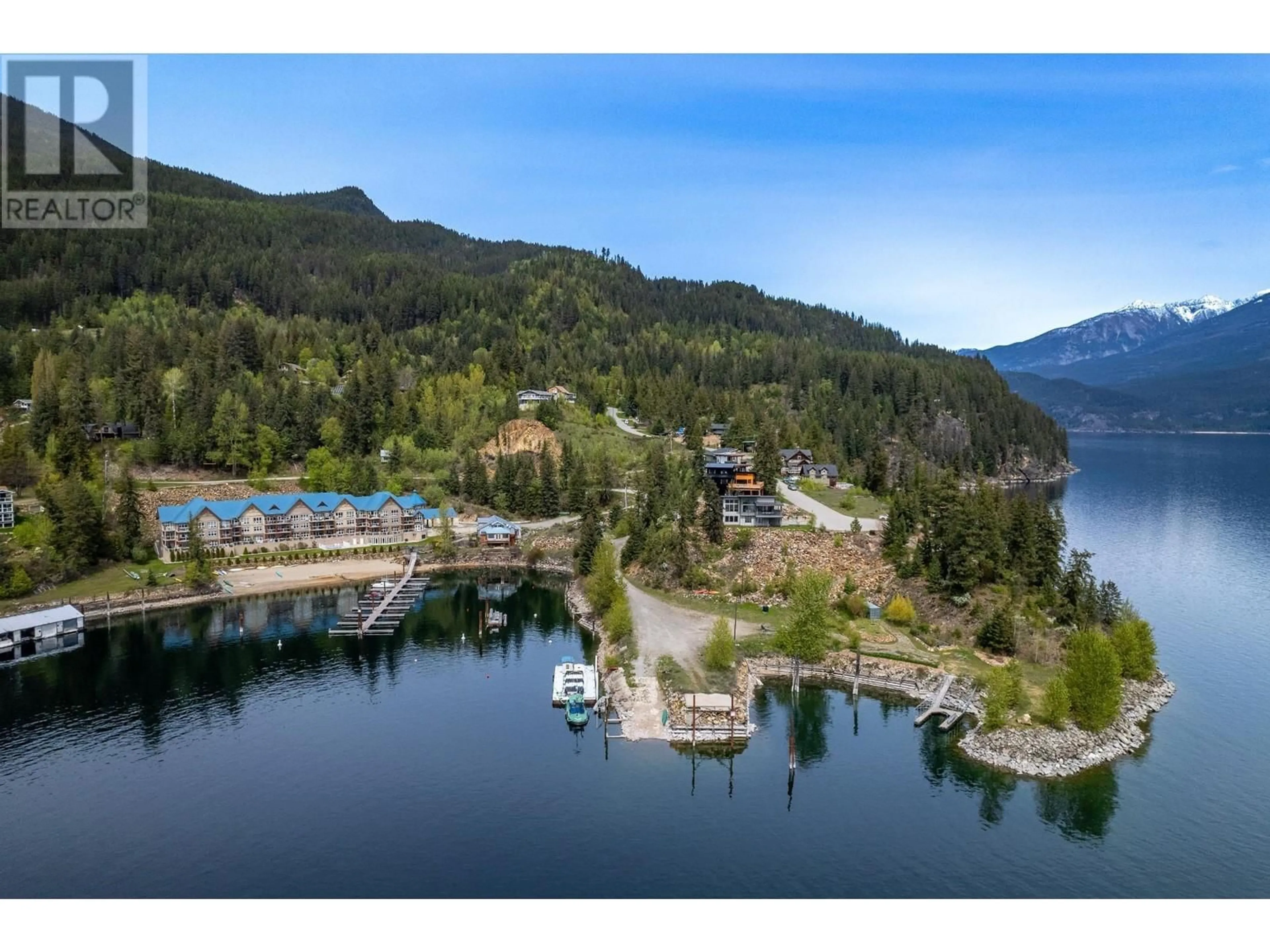 A pic from outside/outdoor area/front of a property/back of a property/a pic from drone, water/lake/river/ocean view for 305 - 550 RAINBOW DRIVE, Kaslo British Columbia V0G1M0