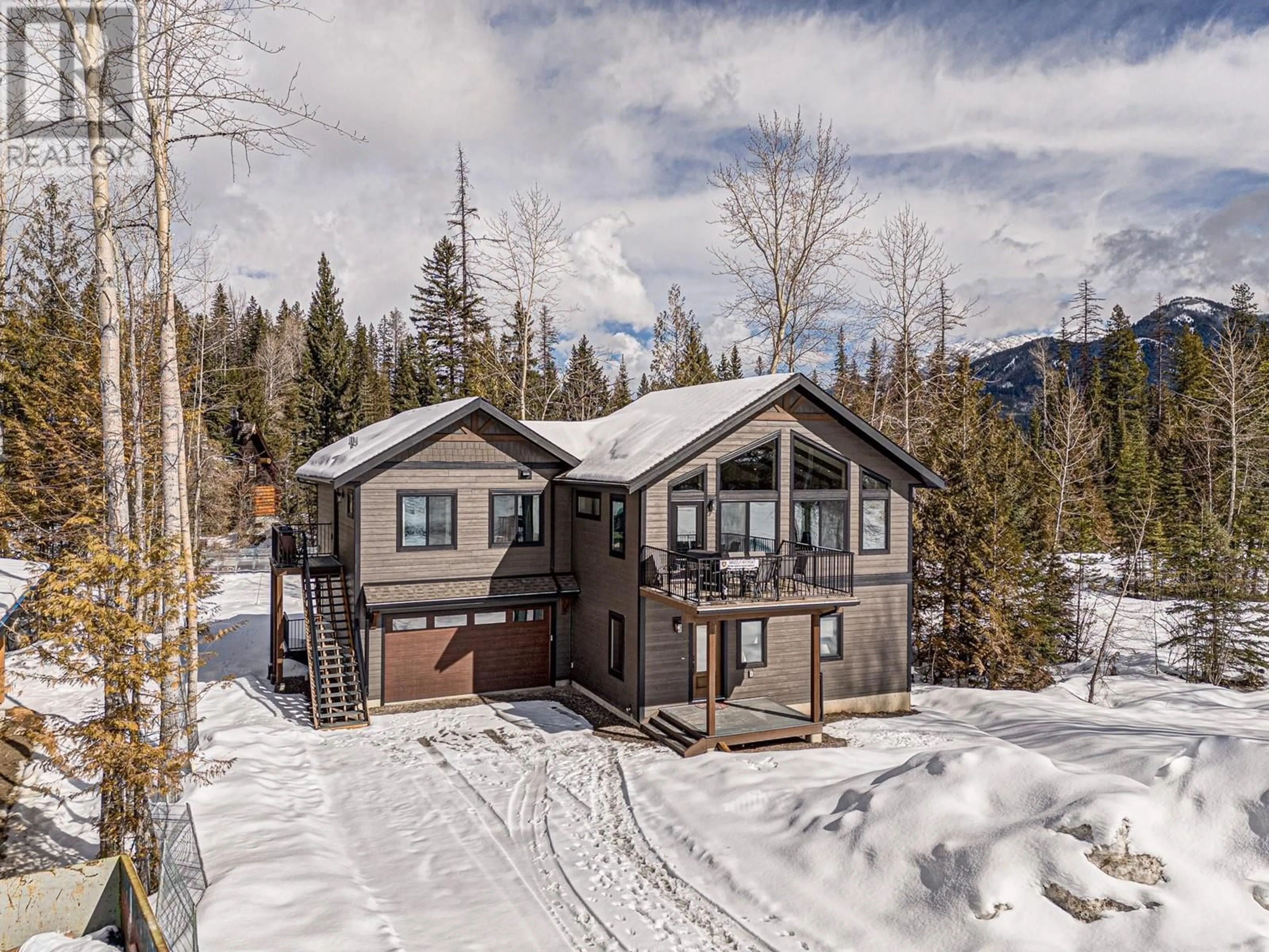 A pic from outside/outdoor area/front of a property/back of a property/a pic from drone, mountain view for 5545 CURRIE BOWL WAY, Fernie British Columbia V0B1M6