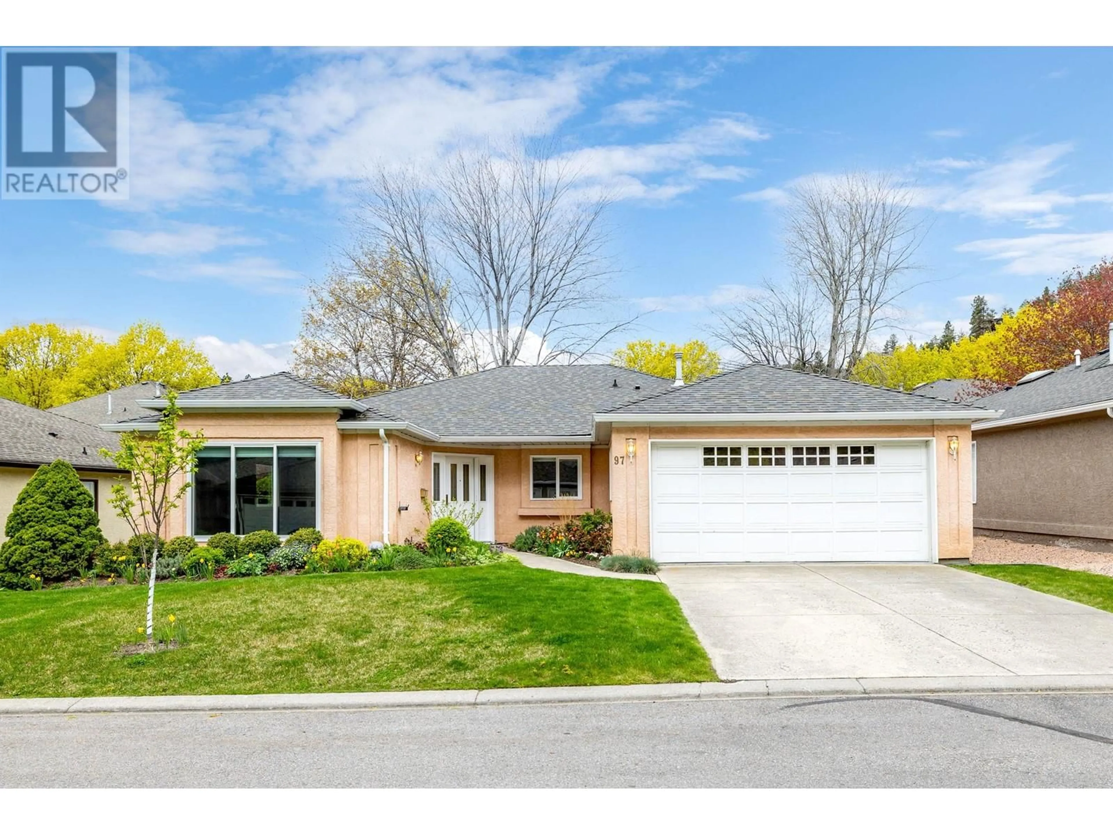 Home with brick exterior material, street for 97 - 615 GLENMEADOWS ROAD, Kelowna British Columbia V1V1N9
