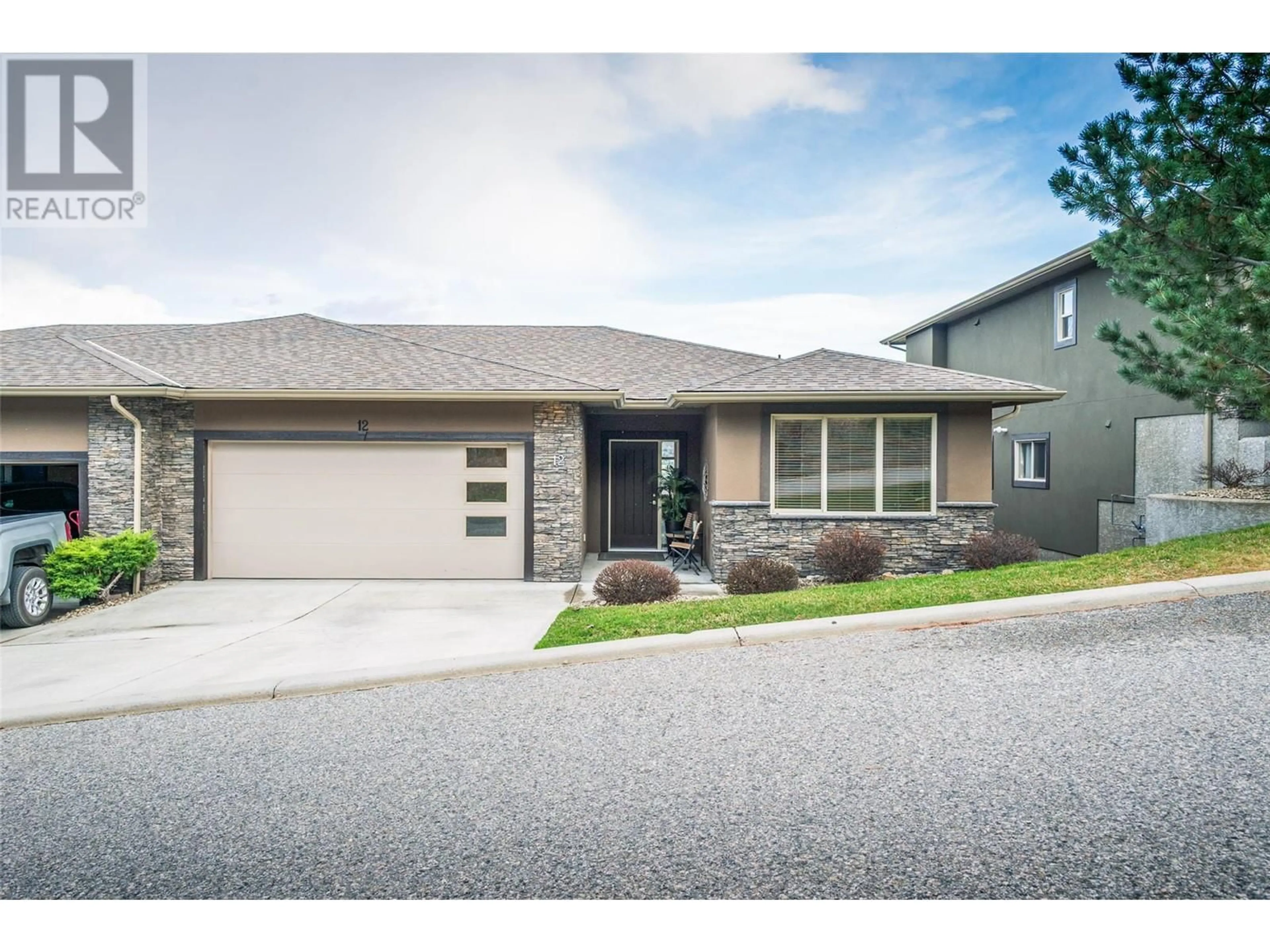Home with brick exterior material, street for 12 - 2421 GLACIER COURT, Kelowna British Columbia V1V3A6