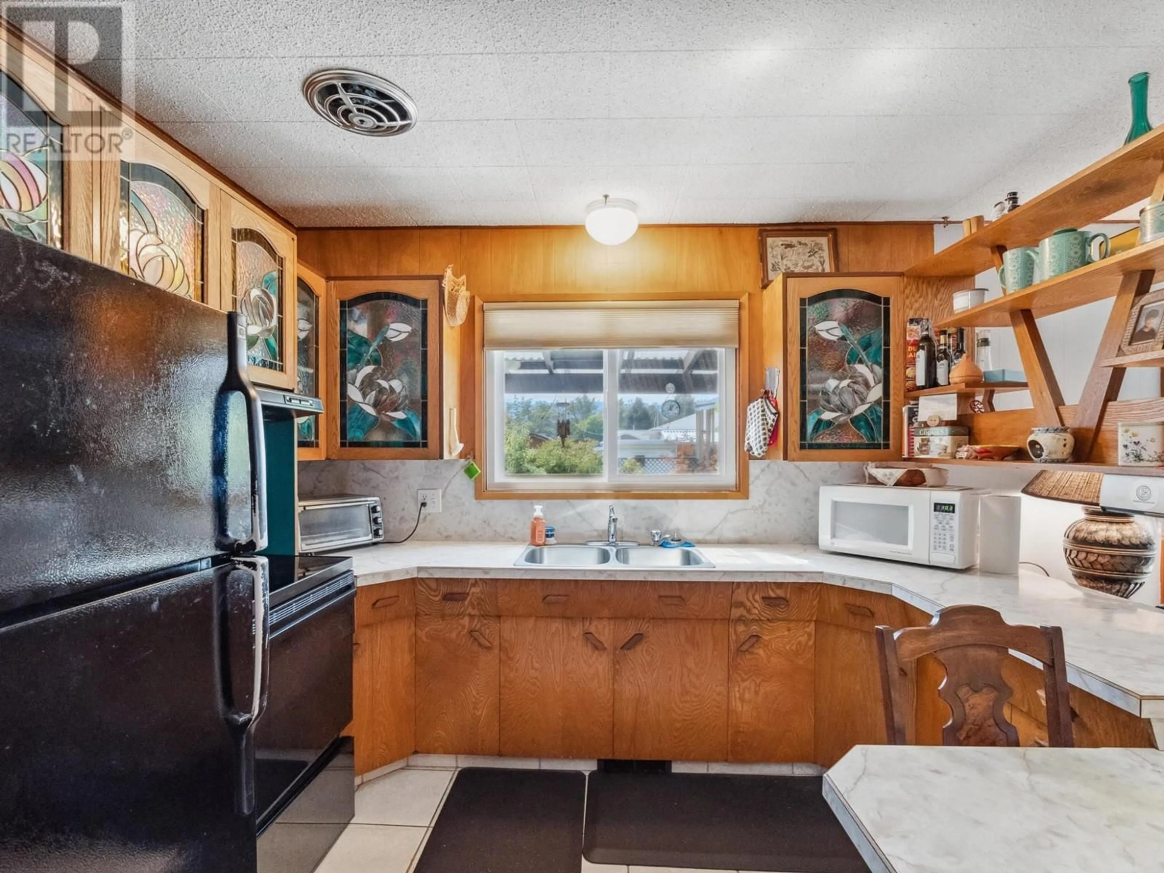 Standard kitchen, ceramic/tile floor for 1150 MARIANNA CRESCENT, Trail British Columbia V1R1E1