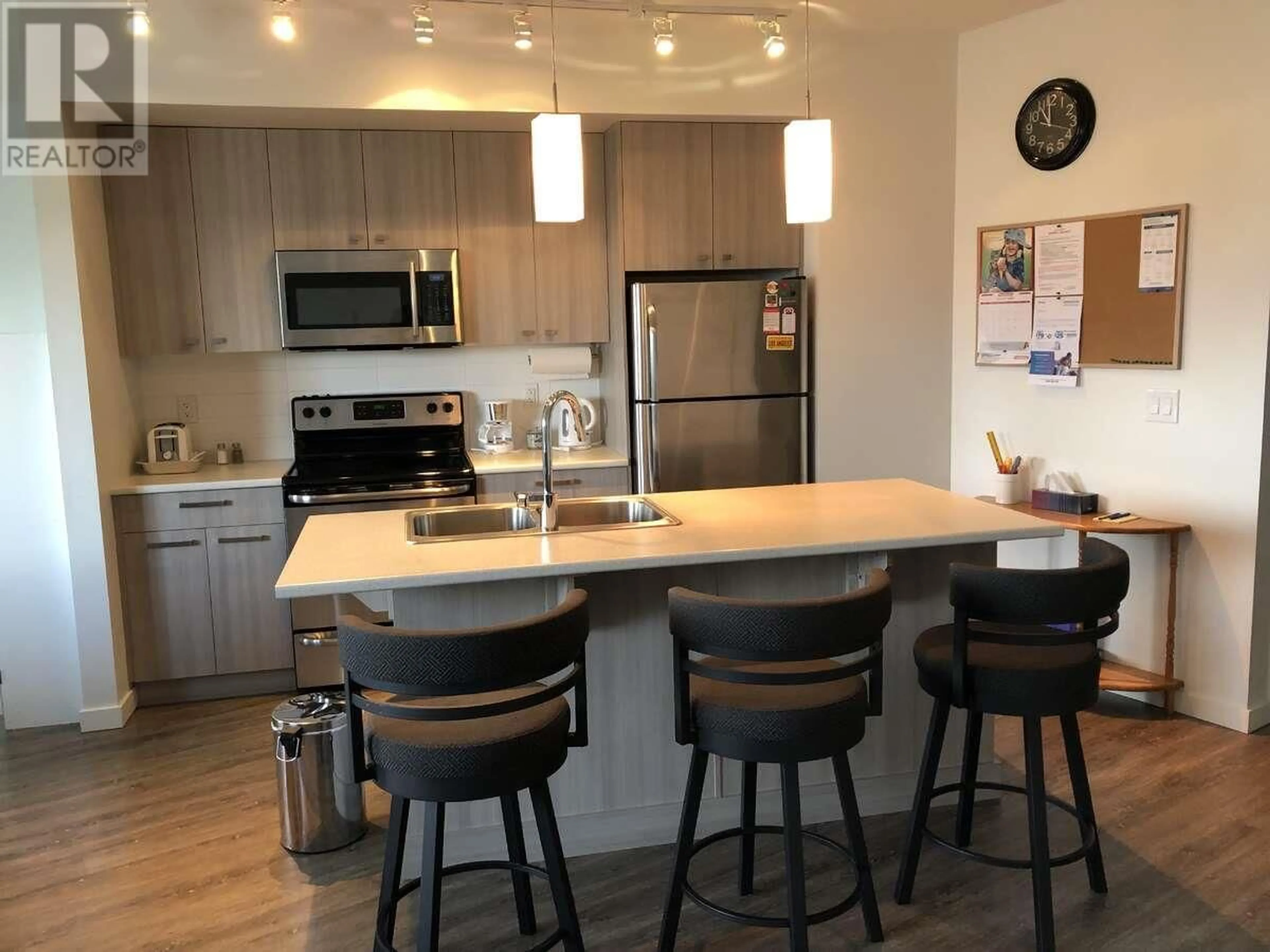 Open concept kitchen, unknown for 207 - 935 ACADEMY WAY, Kelowna British Columbia V1V3C9