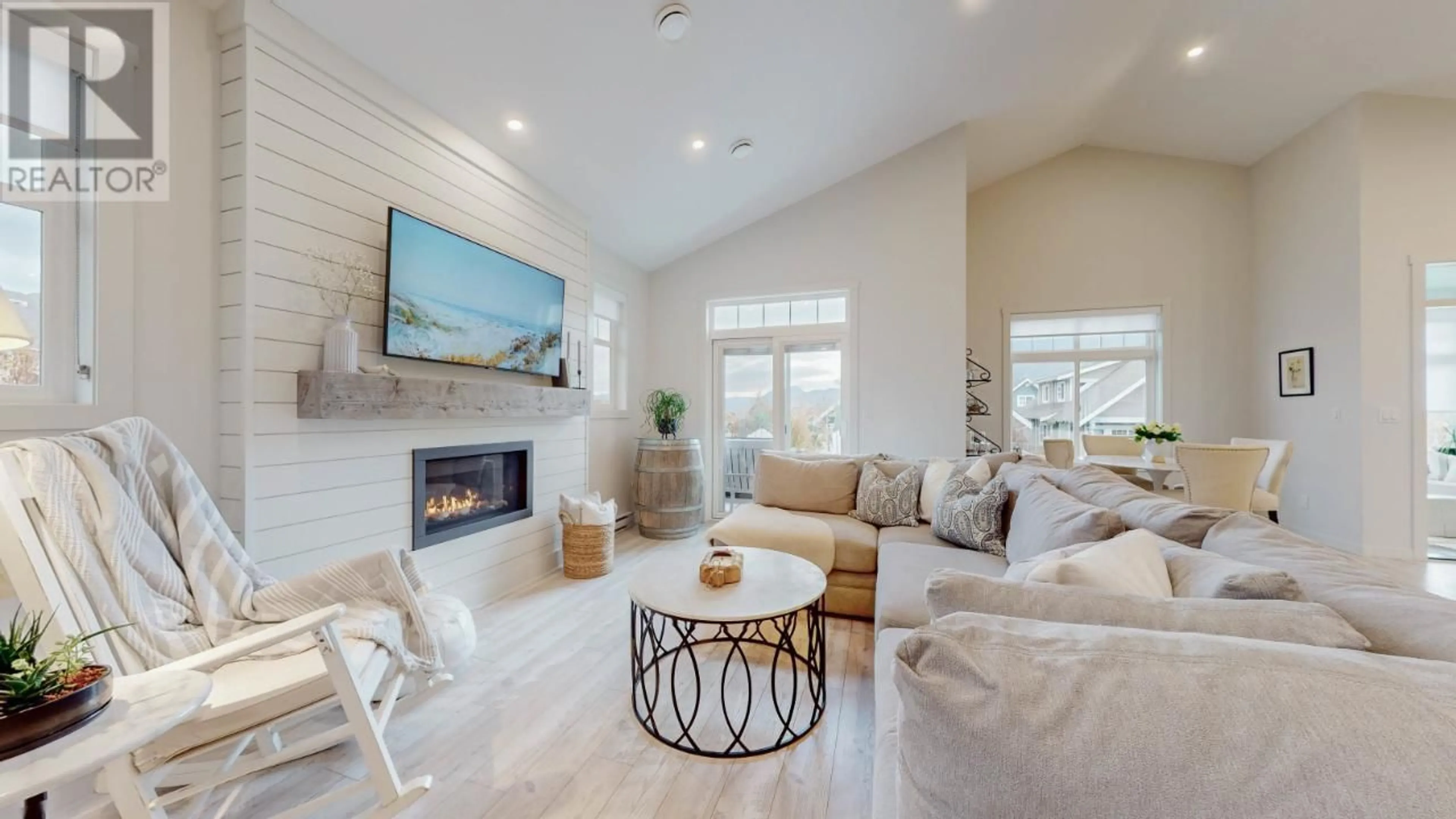 Living room with furniture, ceramic/tile floor for 1A - 2450 RADIO TOWER ROAD, Oliver British Columbia V0H1T1
