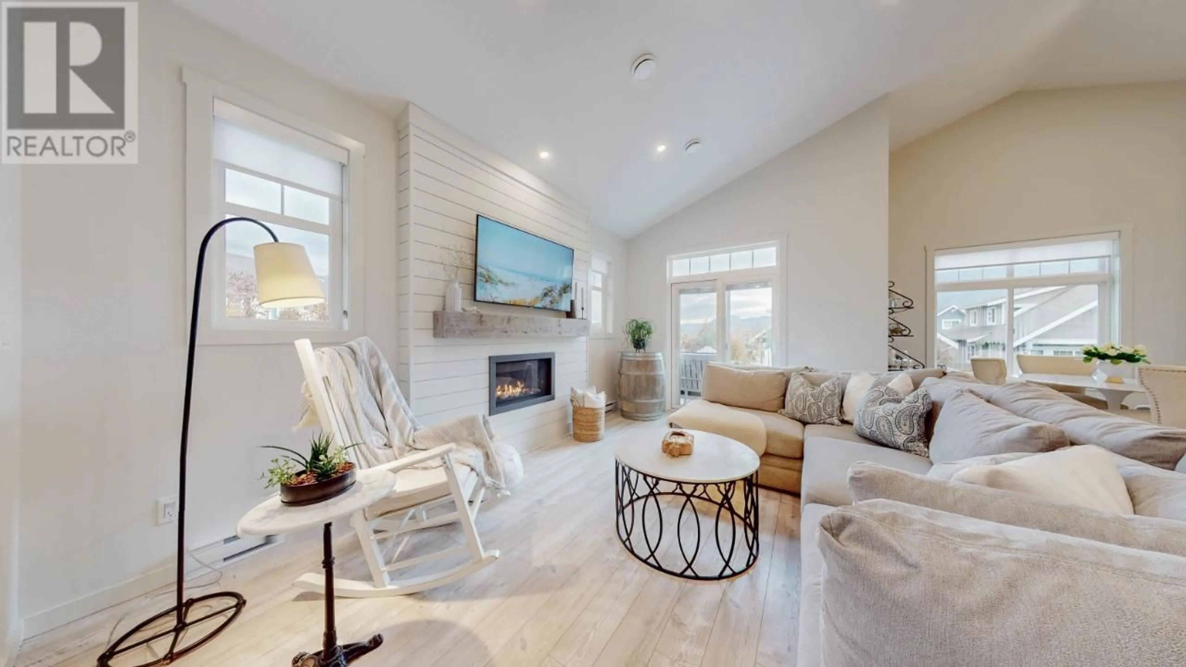 Living room with furniture, ceramic/tile floor for 1A - 2450 RADIO TOWER ROAD, Oliver British Columbia V0H1T1