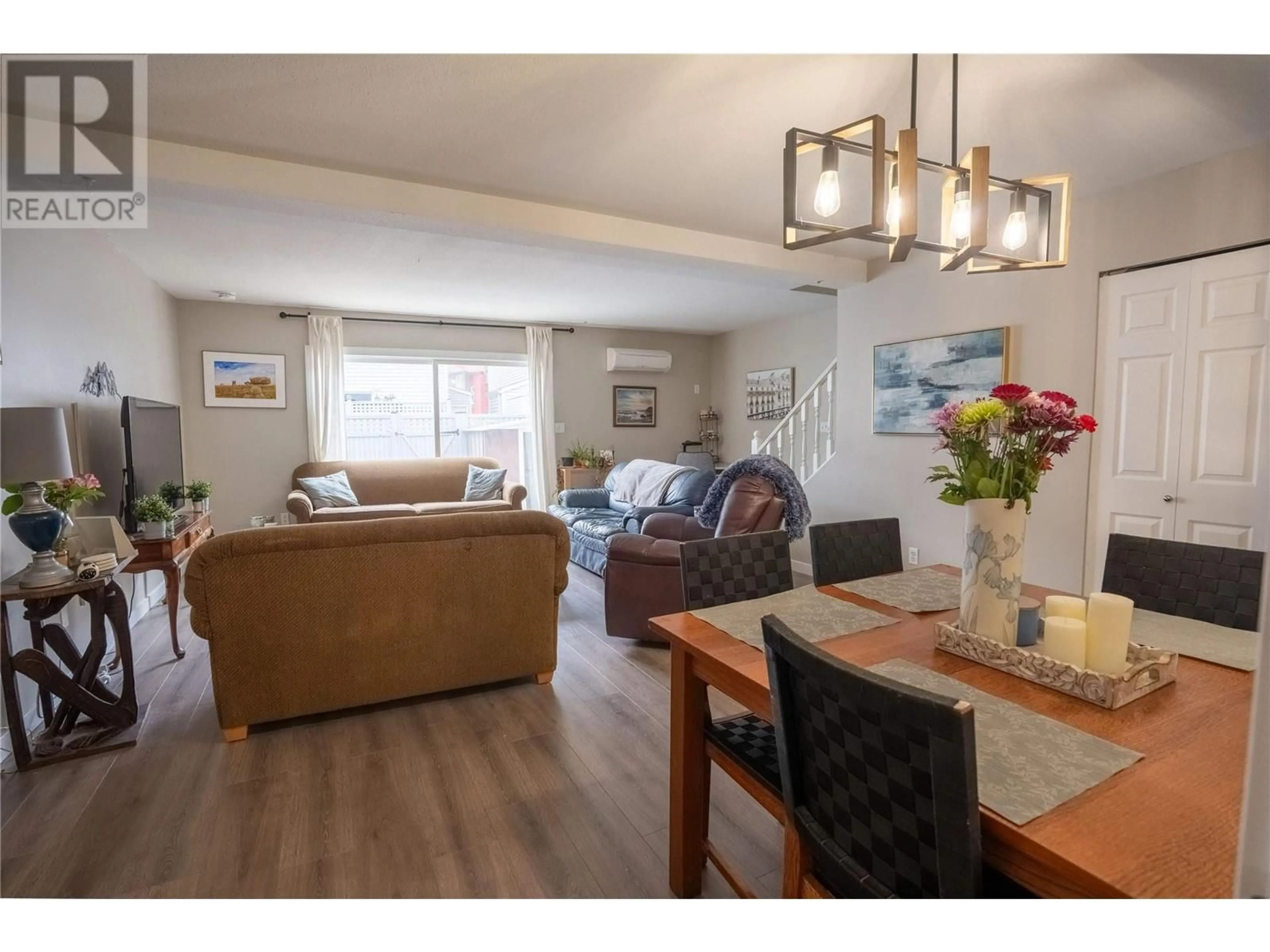 Living room with furniture, wood/laminate floor for 119 - 3315 WILSON STREET, Penticton British Columbia V2A8J3