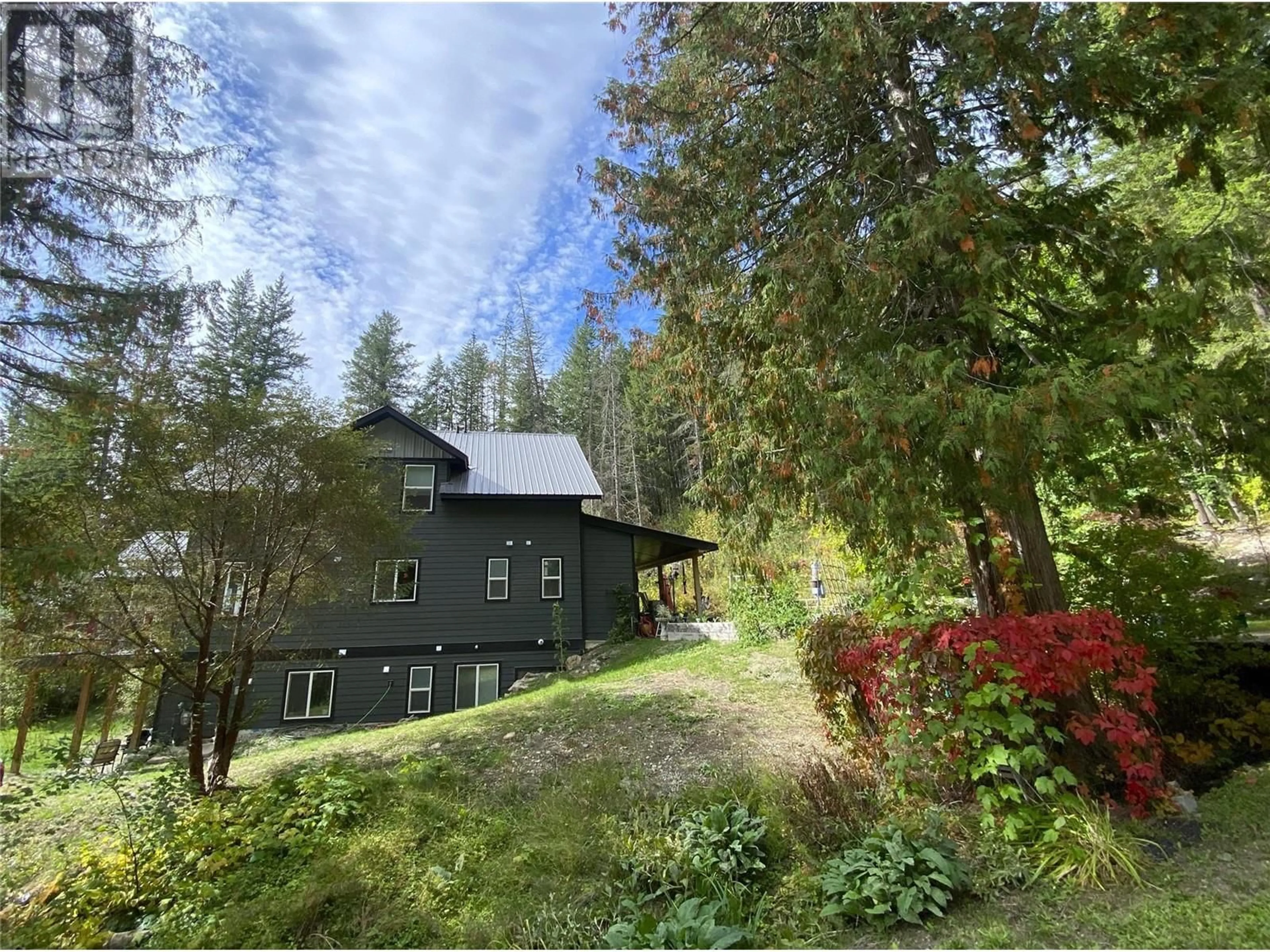 A pic from outside/outdoor area/front of a property/back of a property/a pic from drone, forest/trees view for 7463 BLACK ROAD SOUTHEAST, Salmon Arm British Columbia V1E2P6