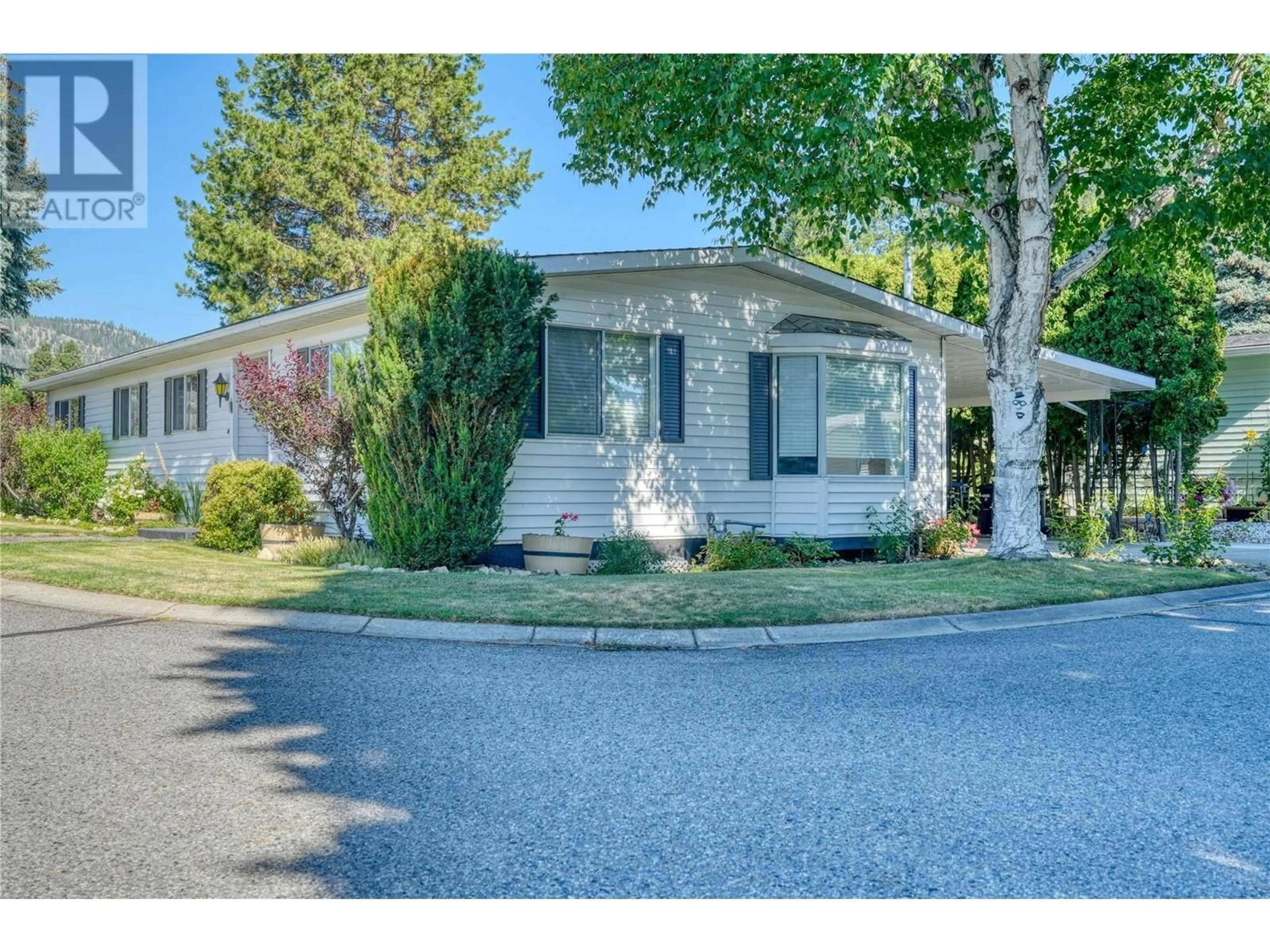 Home with vinyl exterior material, street for 1 - 17017 SNOW AVENUE, Summerland British Columbia V0H1Z6