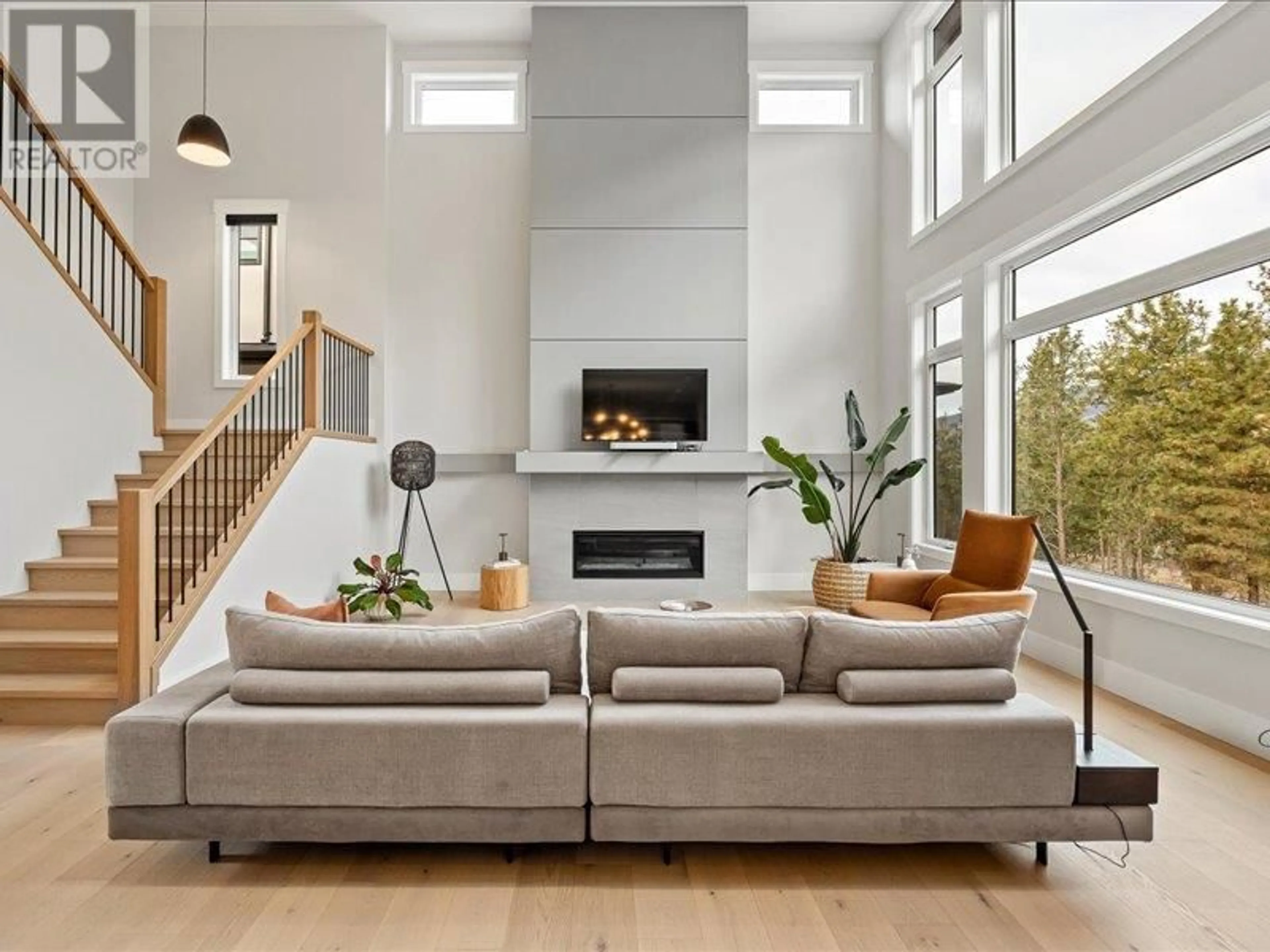 Living room with furniture, unknown for 1524 CABERNET WAY, West Kelowna British Columbia V4T3B5