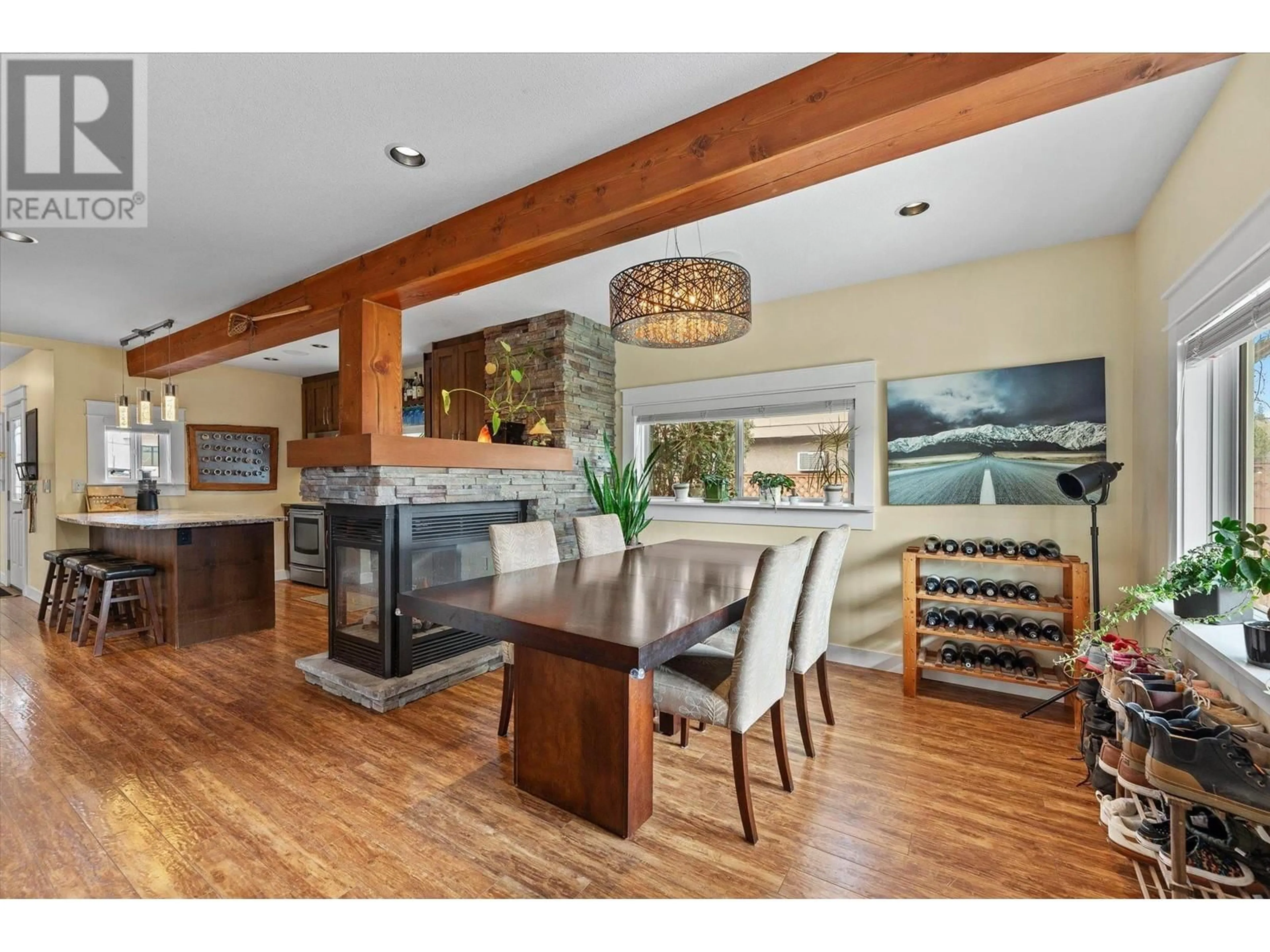 Open concept kitchen, wood/laminate floor for 662 OXFORD AVENUE, Kelowna British Columbia V1Y7L7