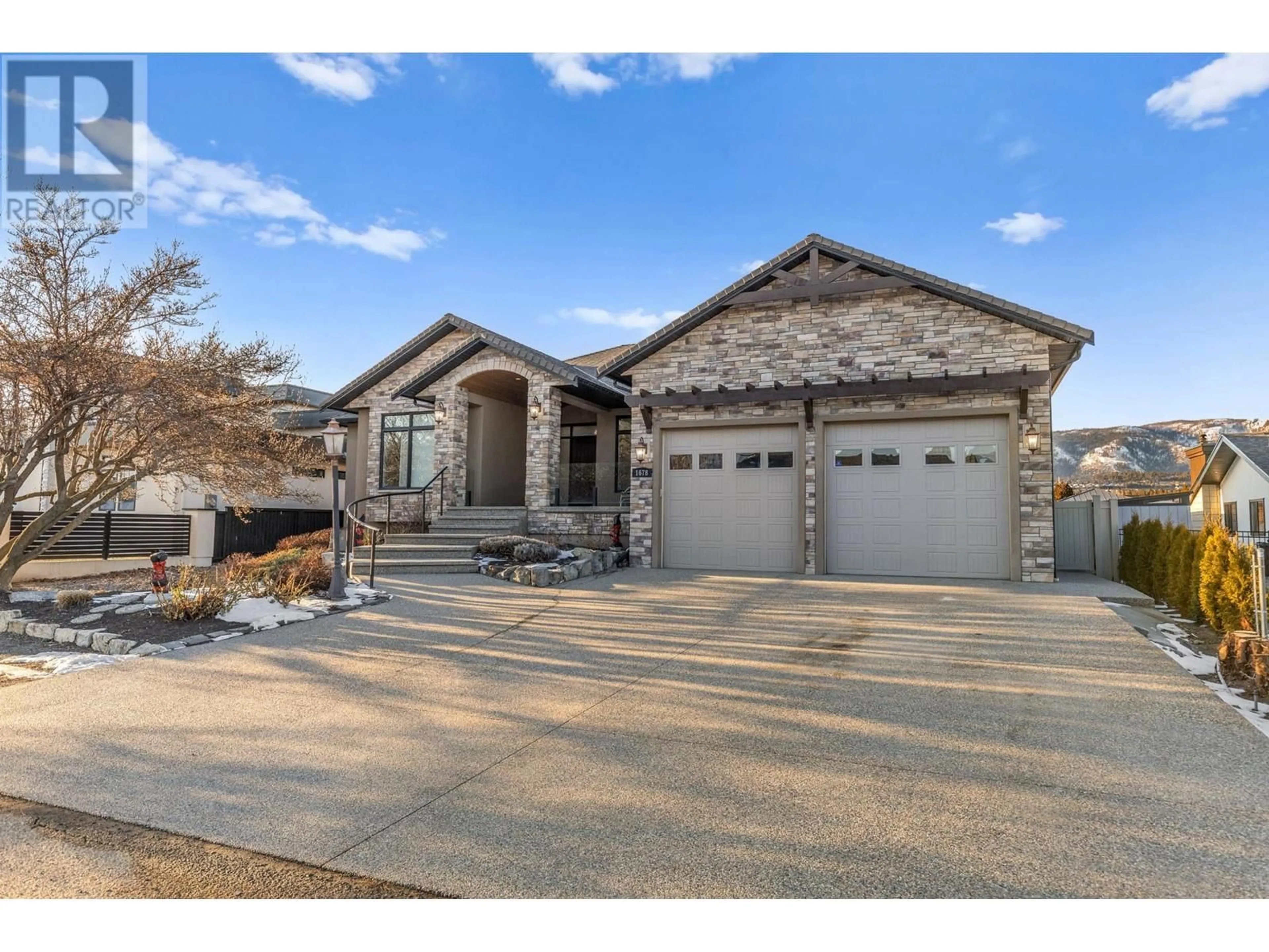 Home with brick exterior material, street for 1678 PRITCHARD DRIVE, West Kelowna British Columbia V4T1X5