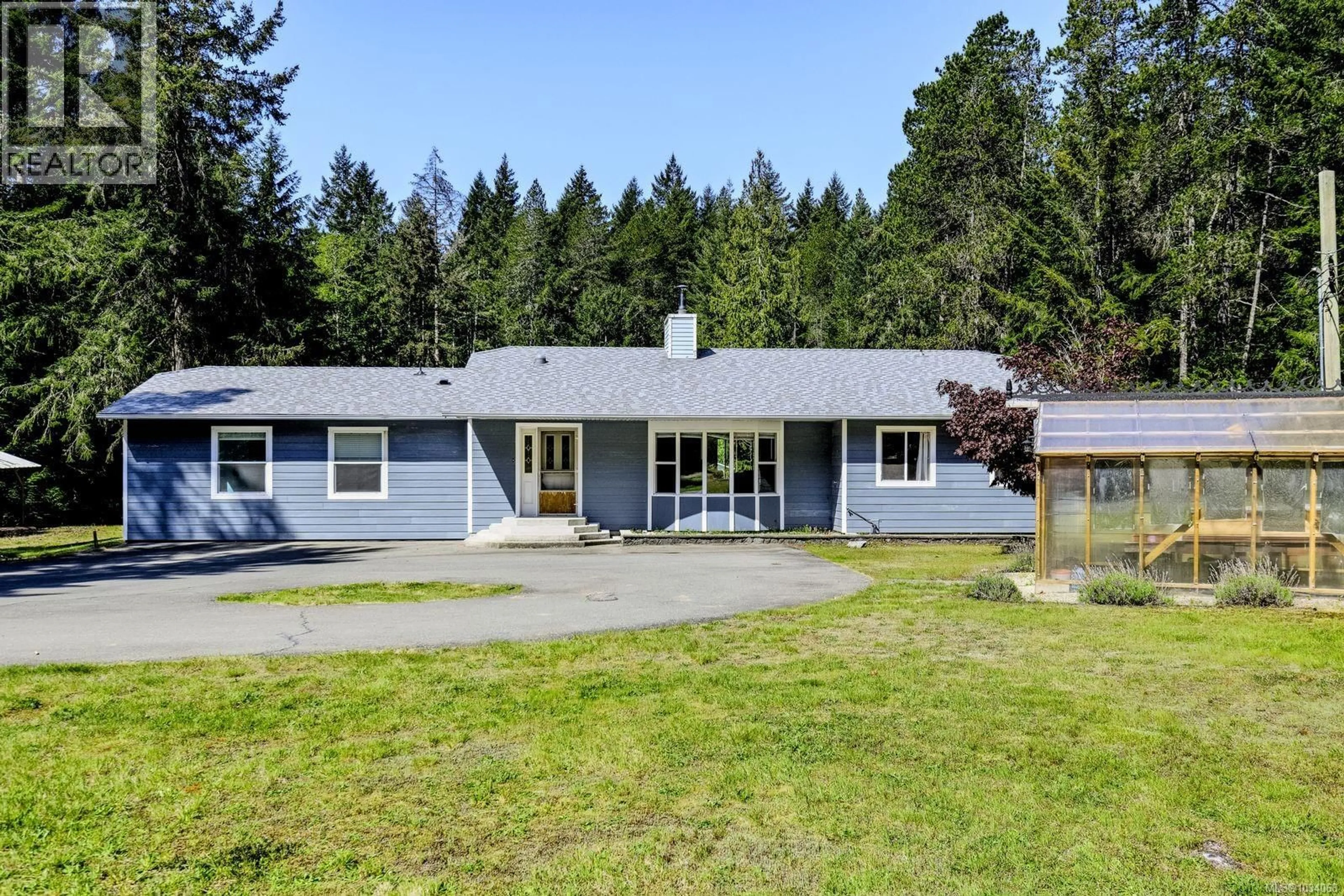 A pic from outside/outdoor area/front of a property/back of a property/a pic from drone, unknown for 520 CORCAN ROAD, Qualicum Beach British Columbia V9K2E9