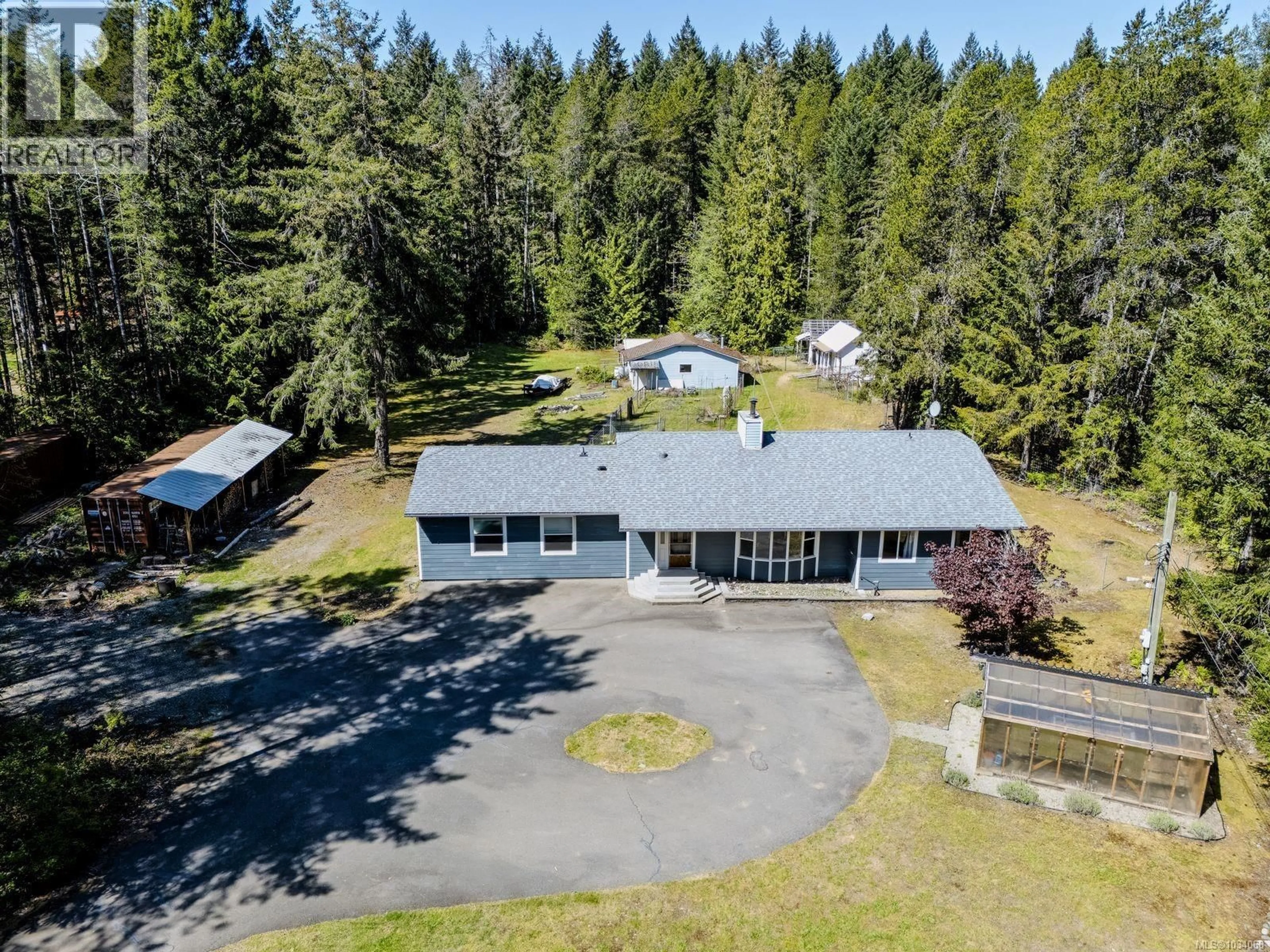 A pic from outside/outdoor area/front of a property/back of a property/a pic from drone, unknown for 520 CORCAN ROAD, Qualicum Beach British Columbia V9K2E9