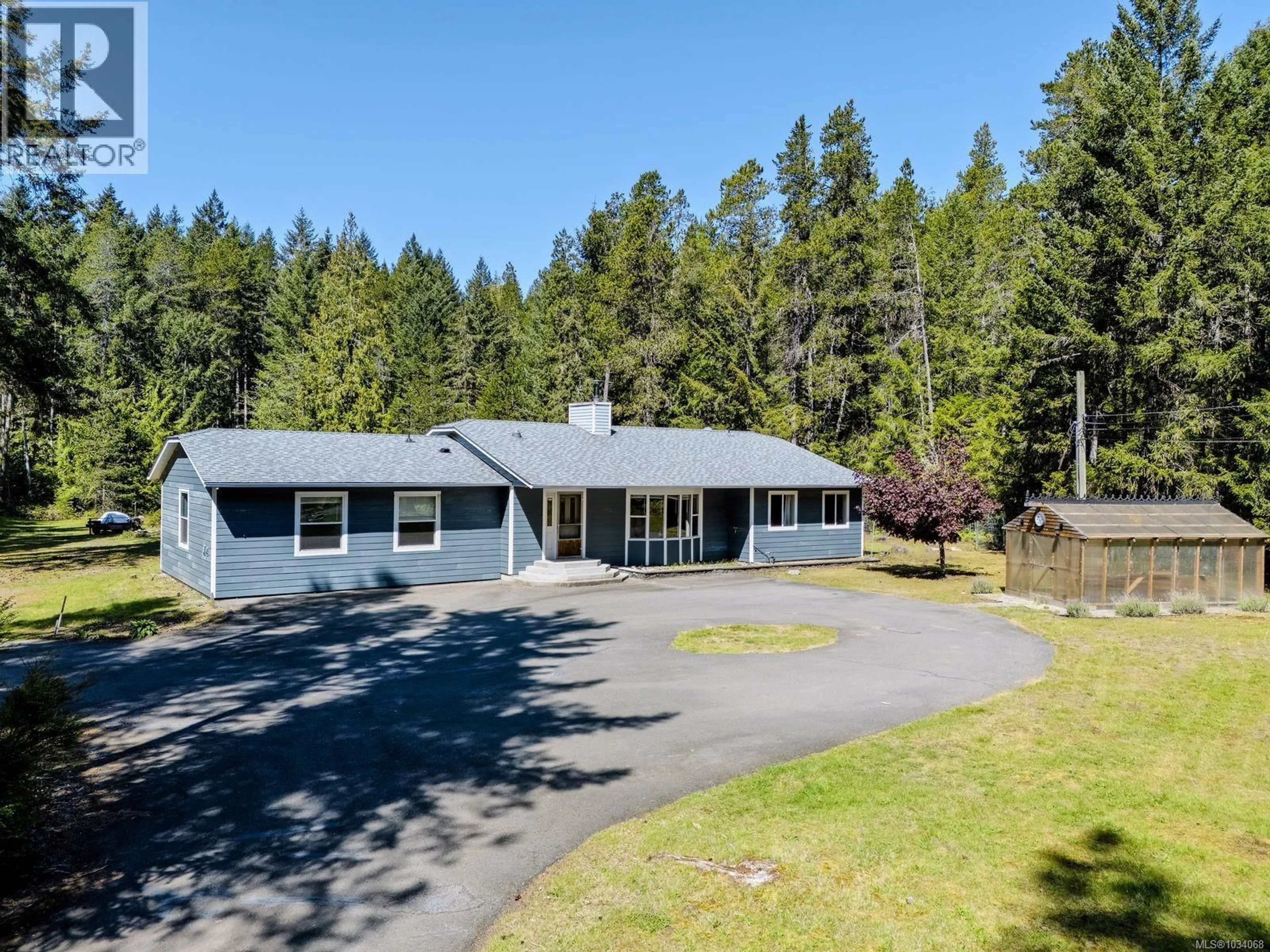 A pic from outside/outdoor area/front of a property/back of a property/a pic from drone, unknown for 520 CORCAN ROAD, Qualicum Beach British Columbia V9K2E9