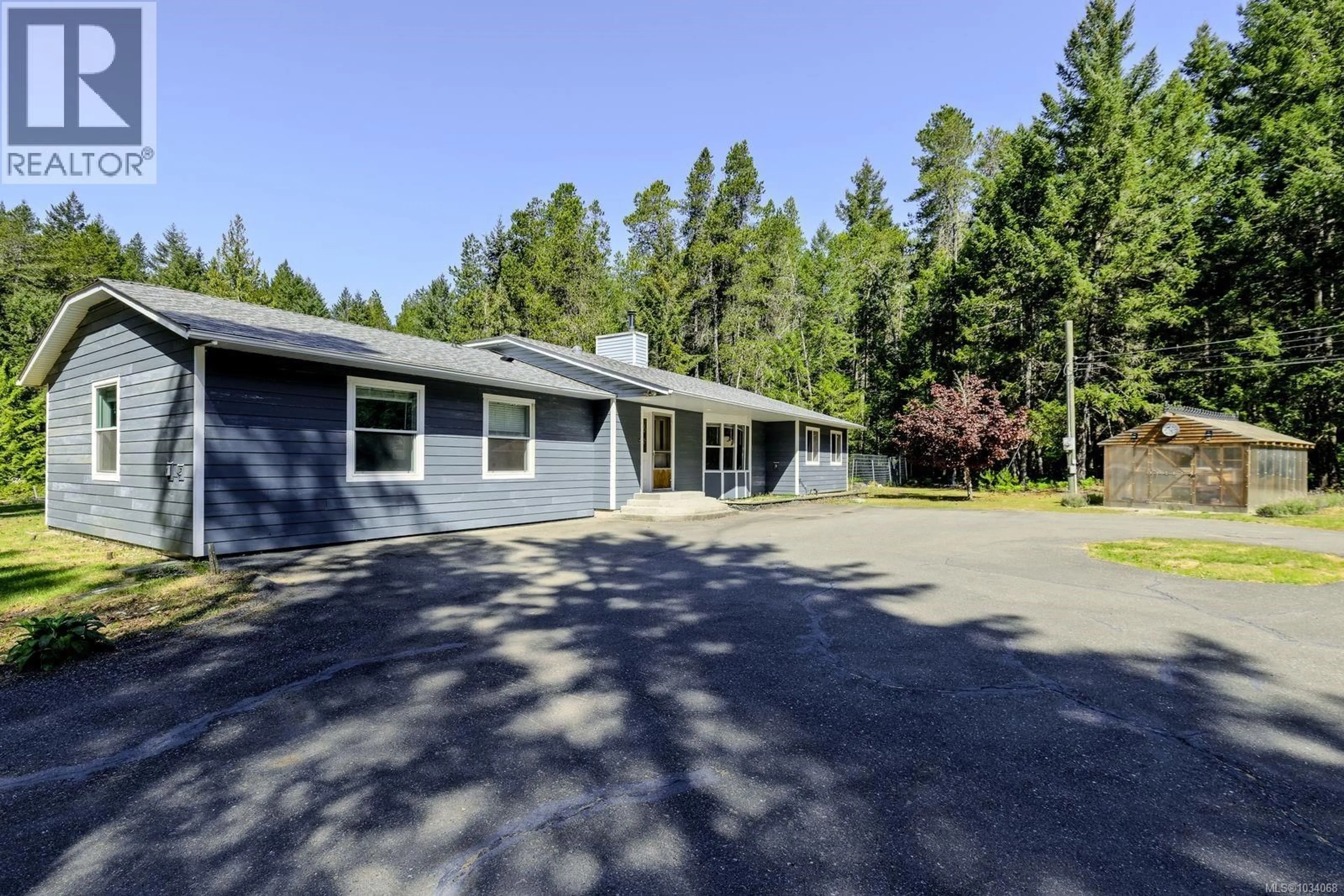 A pic from outside/outdoor area/front of a property/back of a property/a pic from drone, unknown for 520 CORCAN ROAD, Qualicum Beach British Columbia V9K2E9