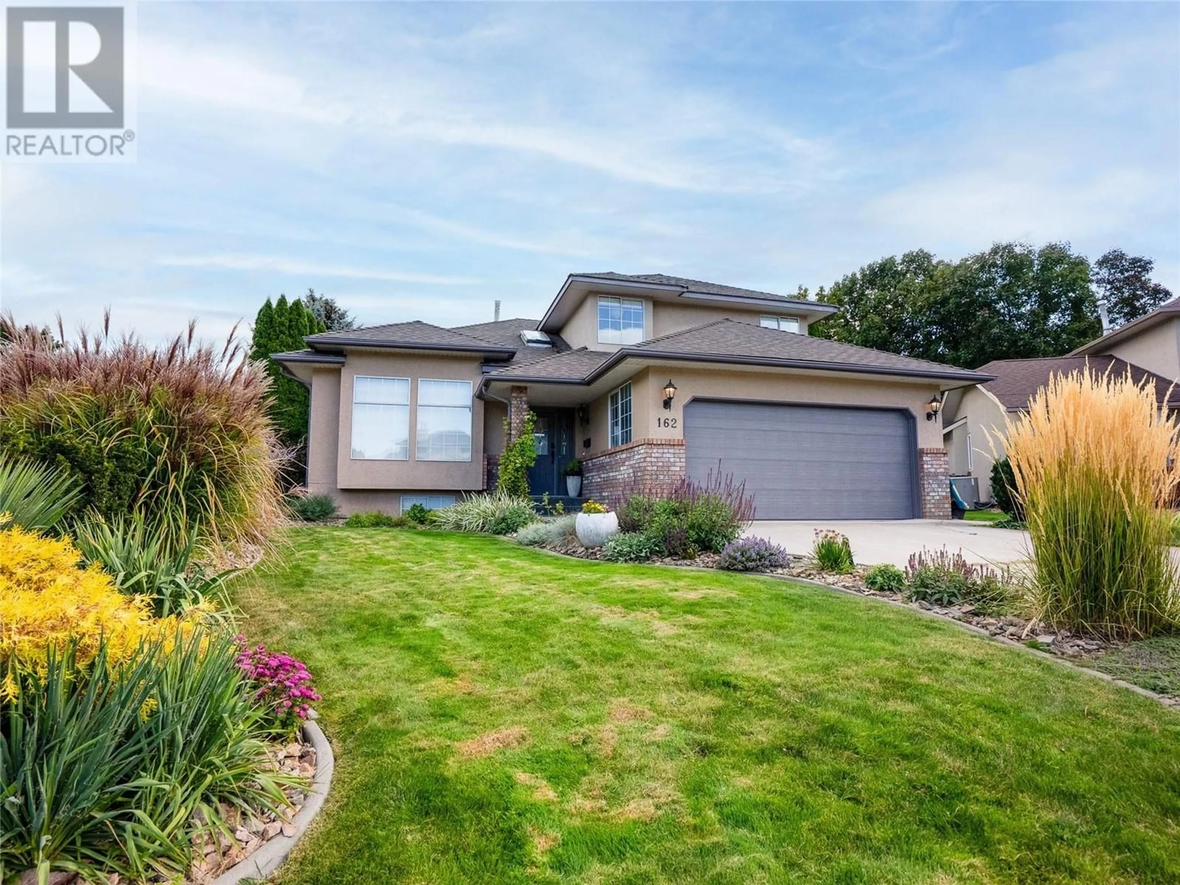 Home with brick exterior material, street for 162 UPLANDS PLACE, Penticton British Columbia V2A7Y1