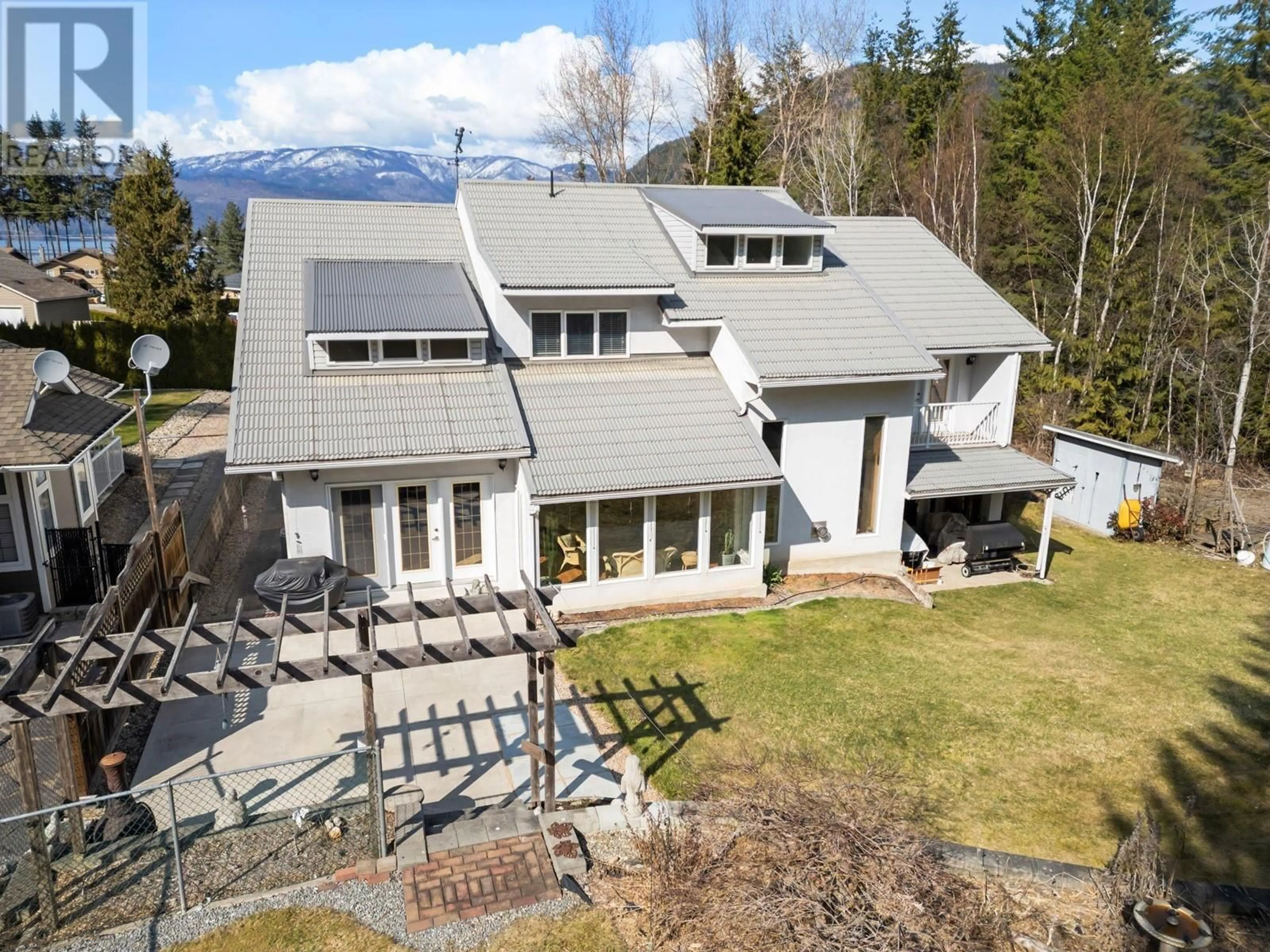 A pic from outside/outdoor area/front of a property/back of a property/a pic from drone, mountain view for 2572 BAYVIEW ROAD, Blind Bay British Columbia V0E1H1