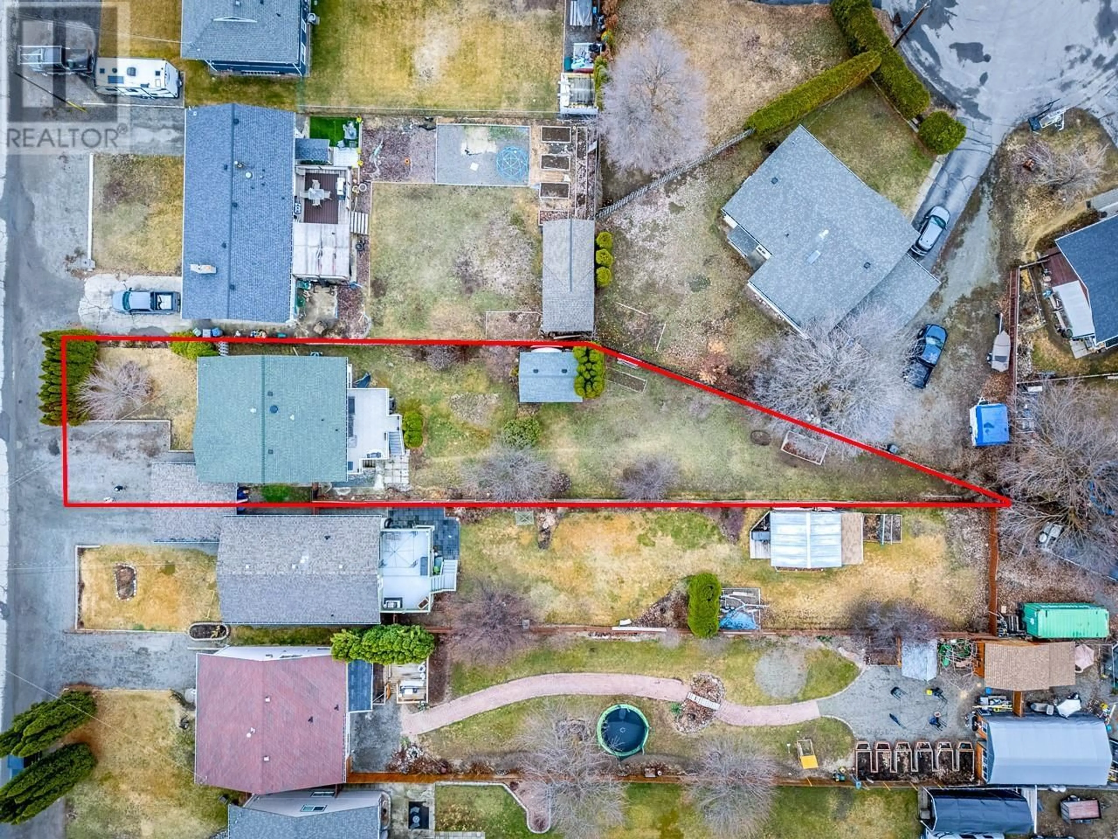 A pic from outside/outdoor area/front of a property/back of a property/a pic from drone, street for 4588 CAMMERAY DRIVE, Kamloops British Columbia V2H1L4