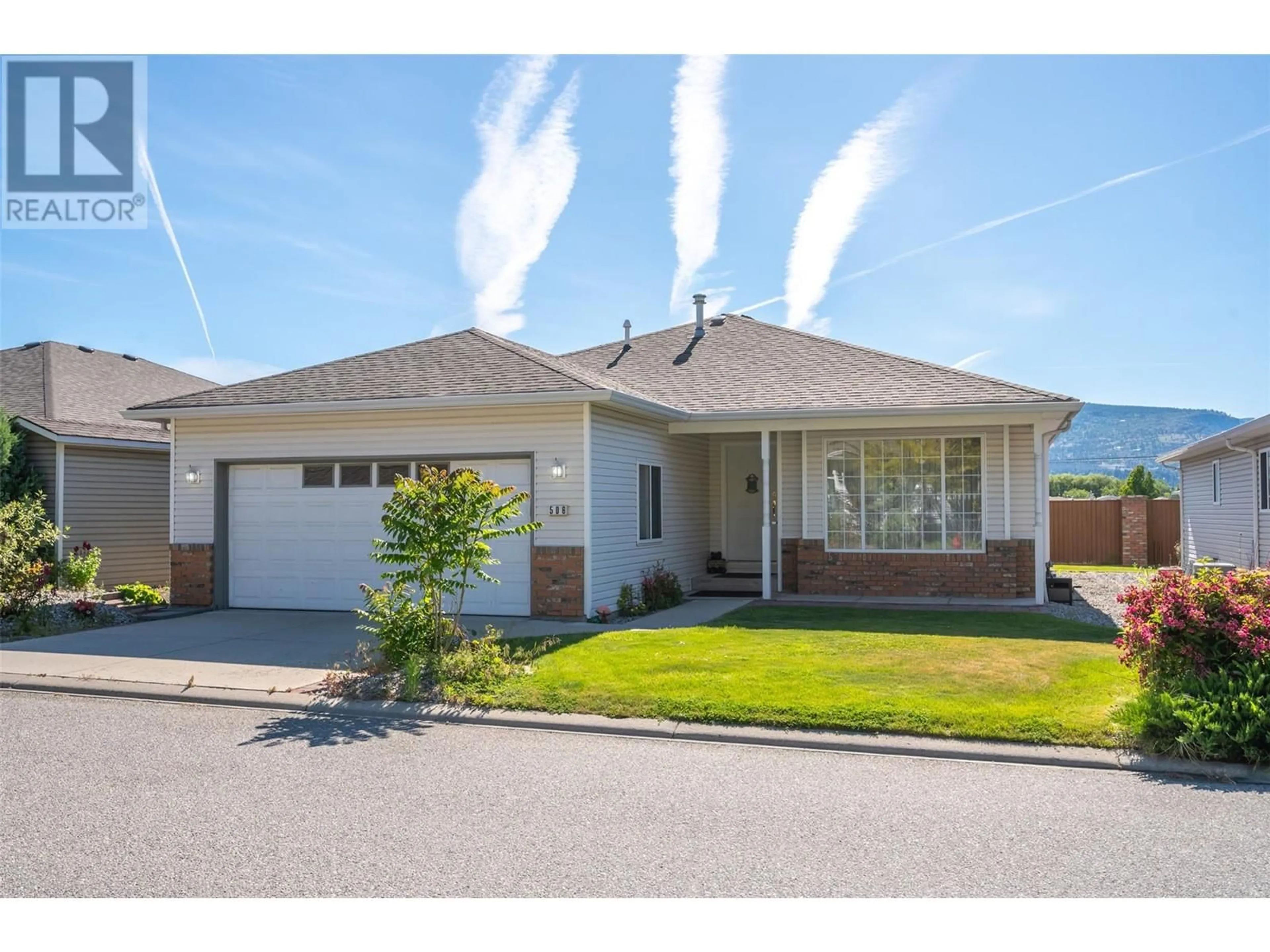 Home with vinyl exterior material, street for 506 RED WING DRIVE, Penticton British Columbia V2A8N7