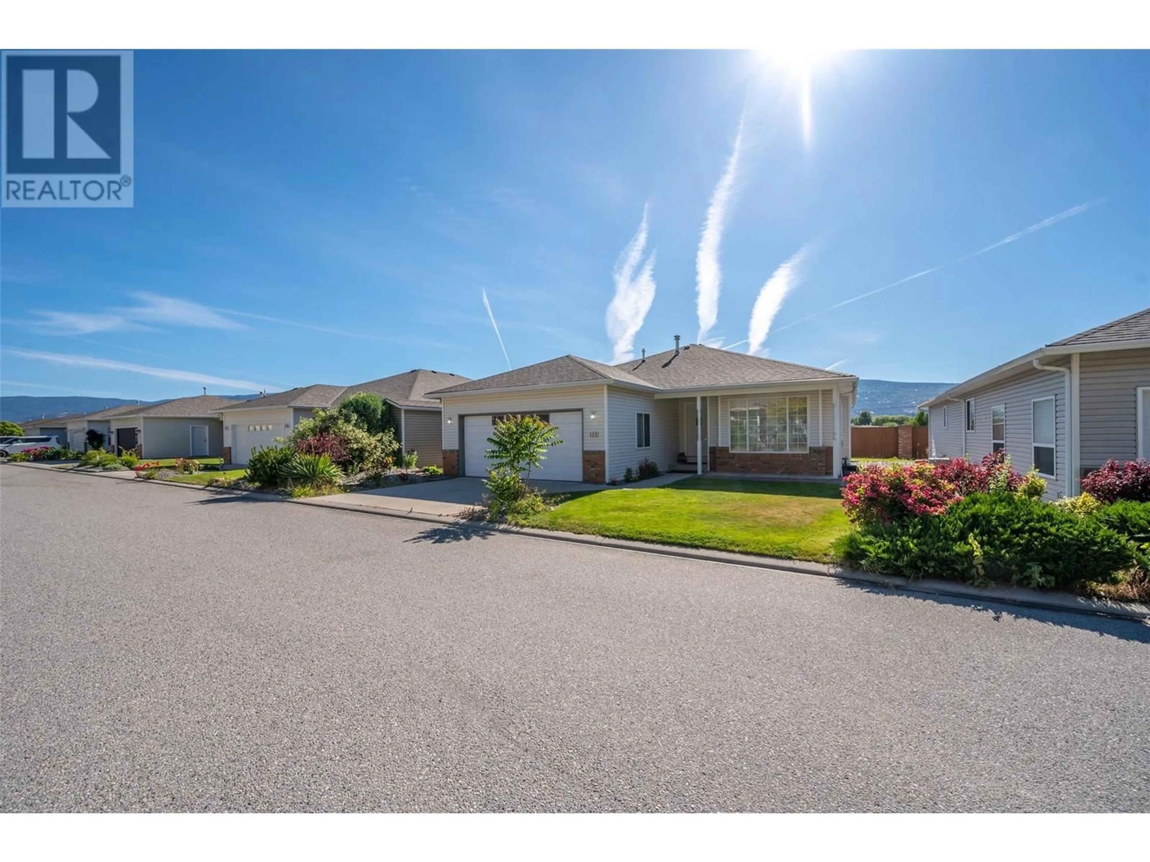 A pic from outside/outdoor area/front of a property/back of a property/a pic from drone, unknown for 506 RED WING DRIVE, Penticton British Columbia V2A8N7