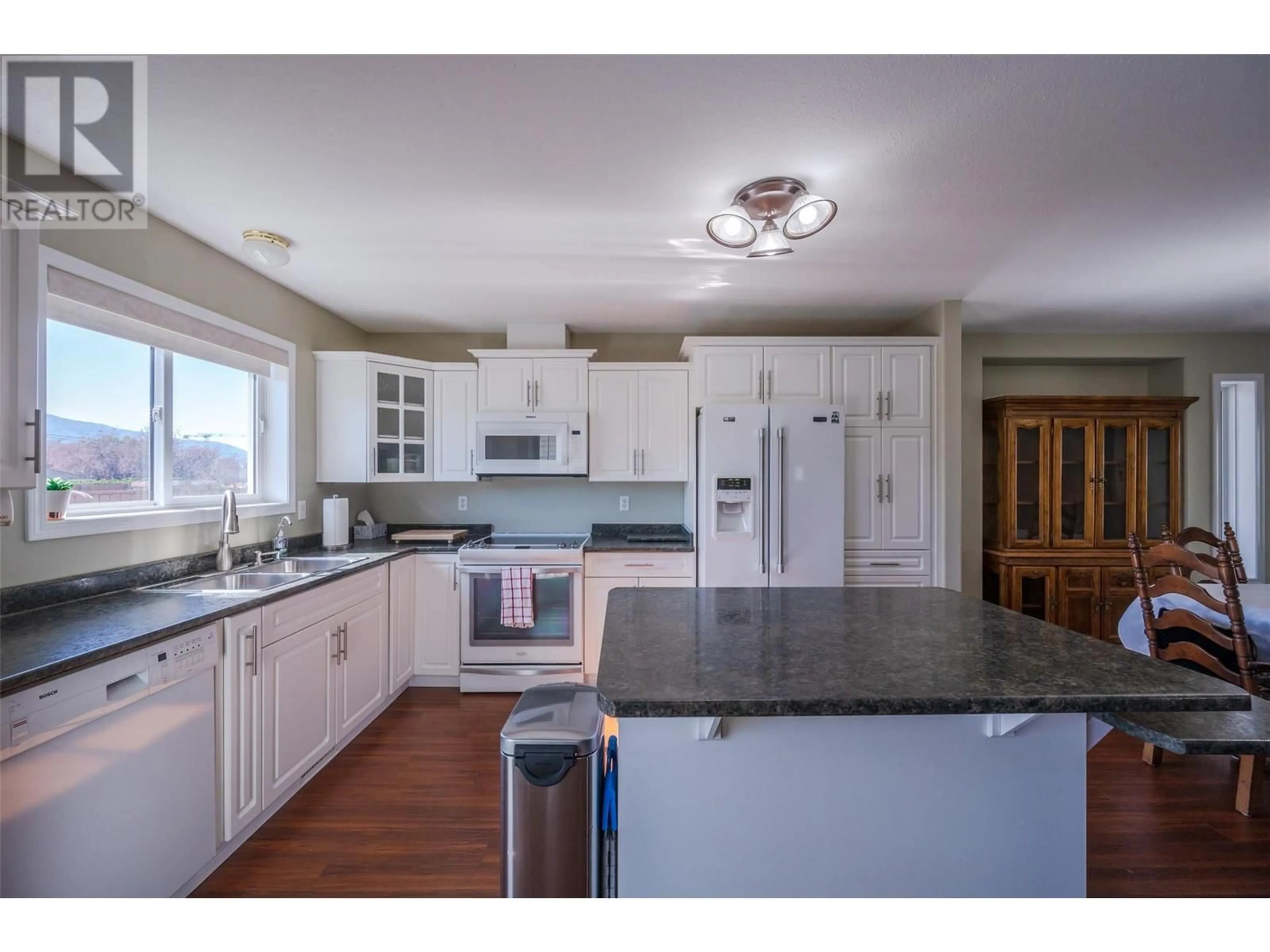 Open concept kitchen, unknown for 506 RED WING DRIVE, Penticton British Columbia V2A8N7