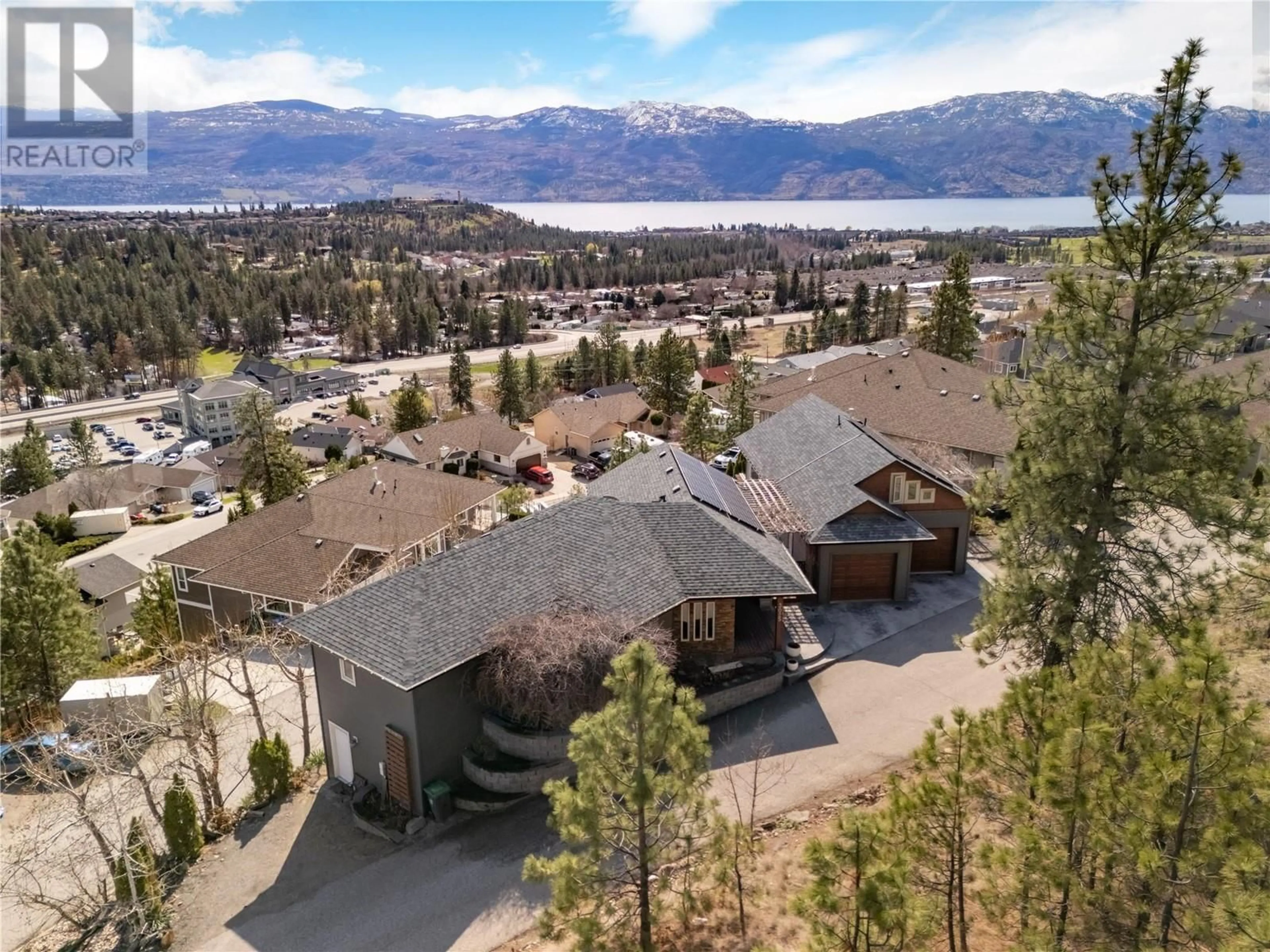 A pic from outside/outdoor area/front of a property/back of a property/a pic from drone, mountain view for 3025 ENSIGN LANE, West Kelowna British Columbia V4T2Z4