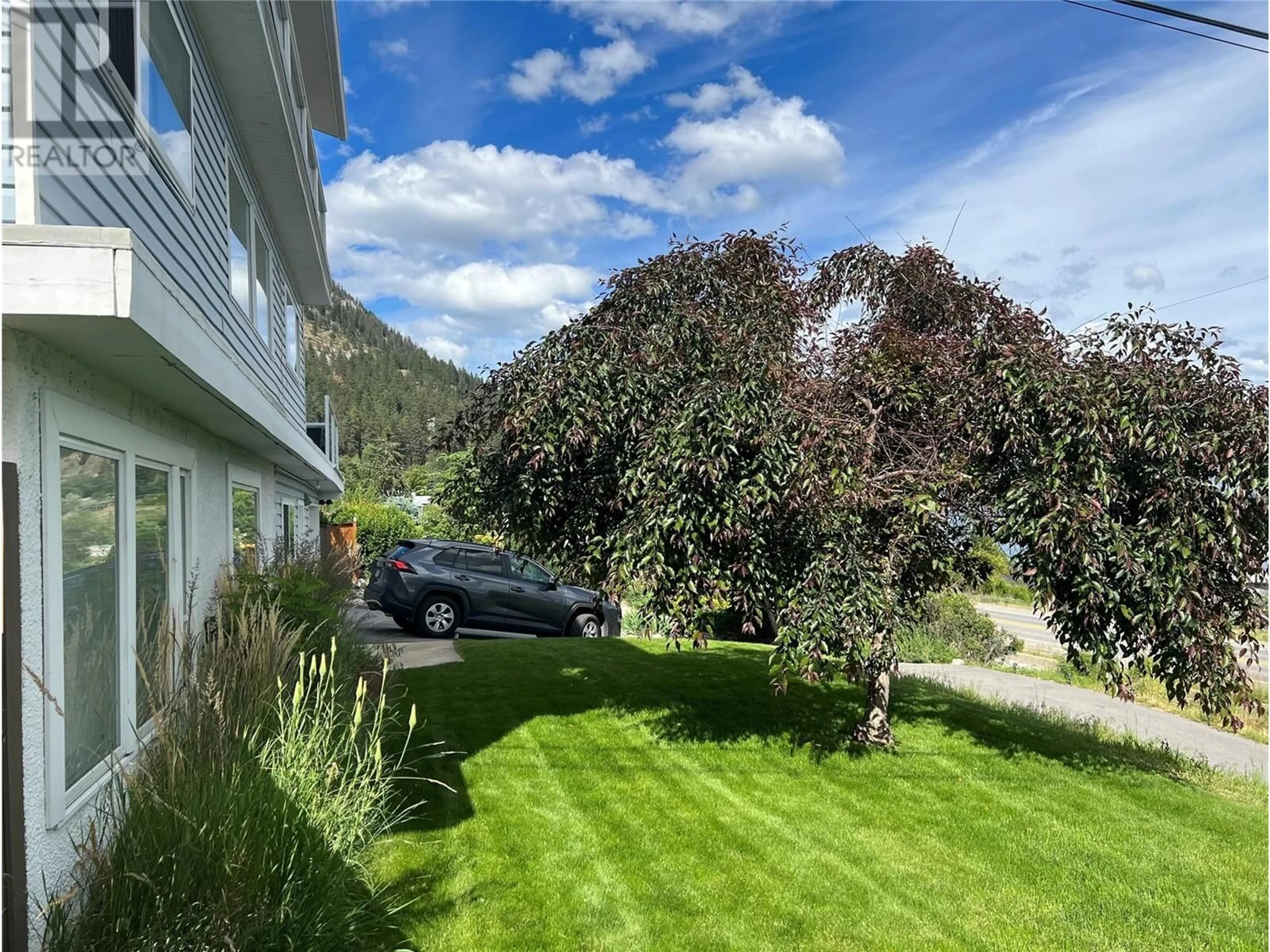 A pic from outside/outdoor area/front of a property/back of a property/a pic from drone, mountain view for 5262 HUSTON ROAD, Peachland British Columbia V0H1X2