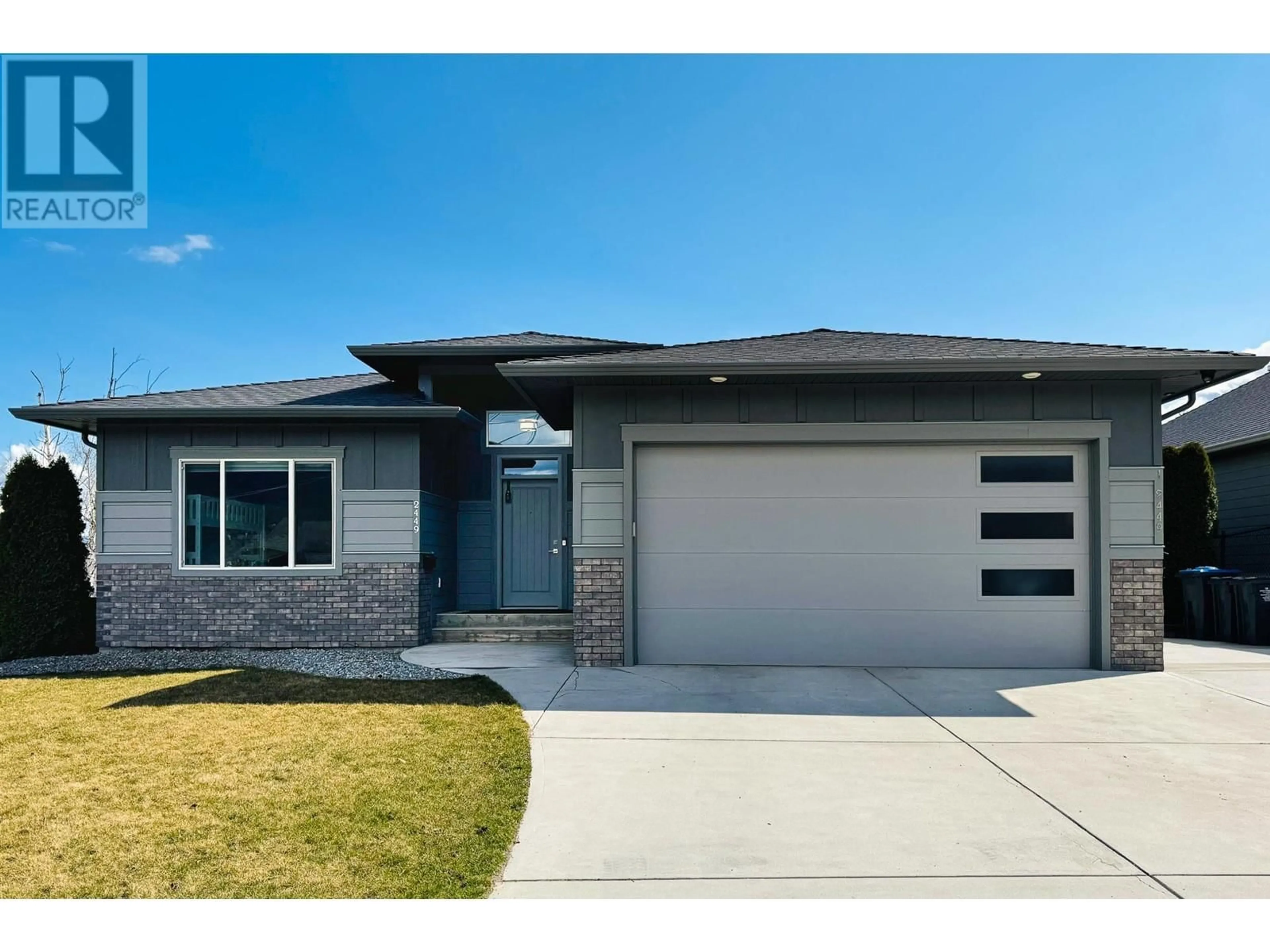 Home with brick exterior material, street for 2449 HARMON ROAD, West Kelowna British Columbia V1Z2C1