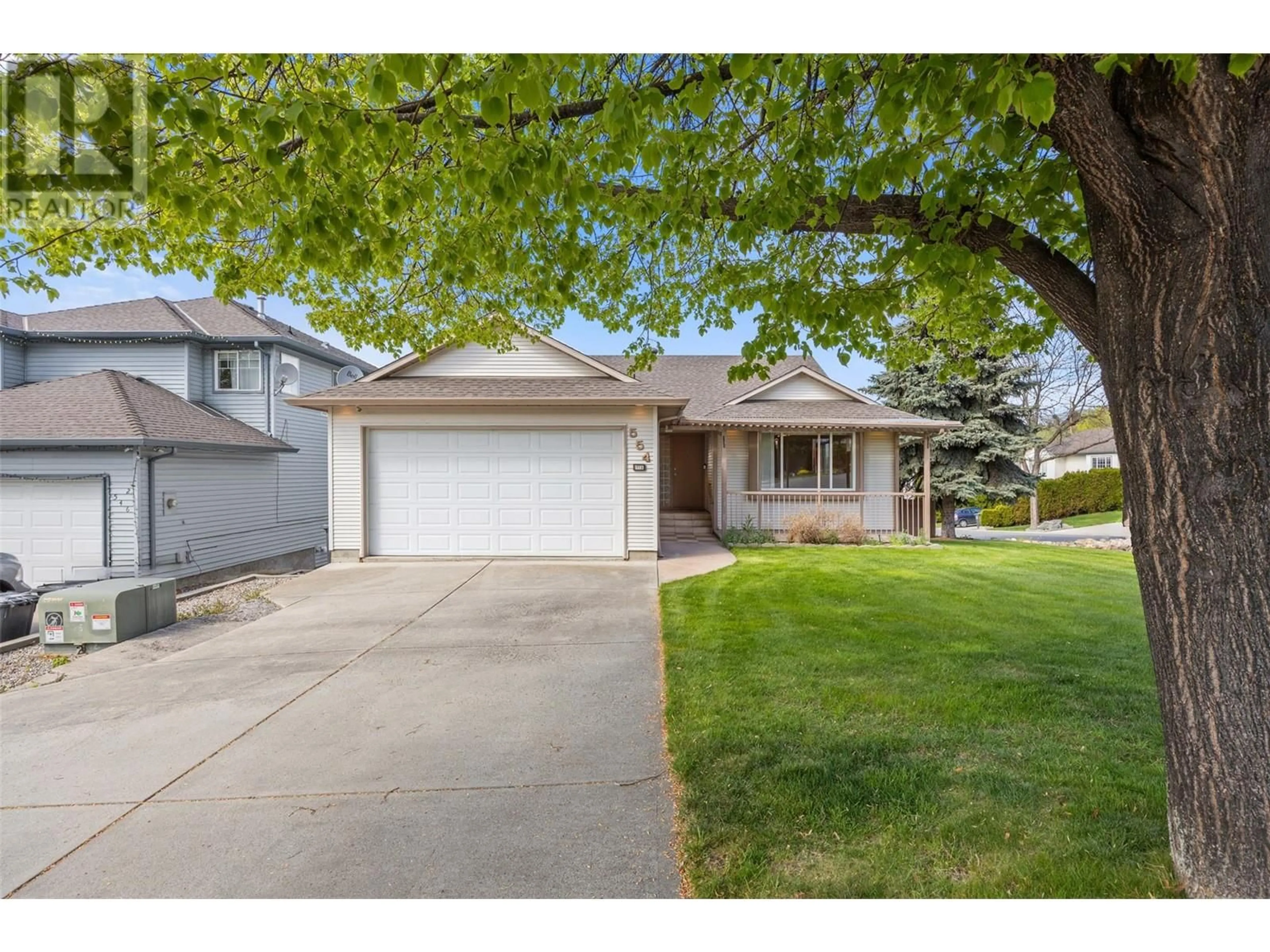 Home with vinyl exterior material, street for 554 HOLBROOK ROAD EAST, Kelowna British Columbia V1X7G8