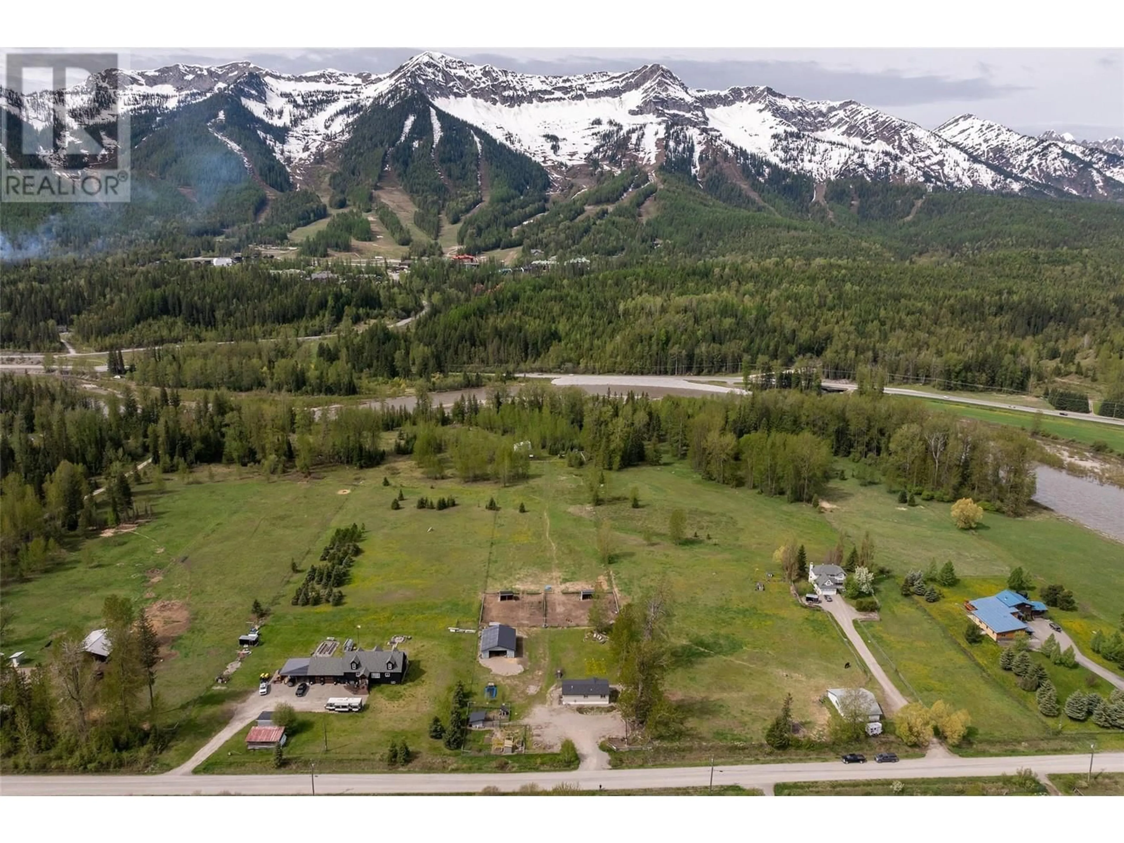 A pic from outside/outdoor area/front of a property/back of a property/a pic from drone, mountain view for 4103 HILL ROAD, Fernie British Columbia V0B1M4