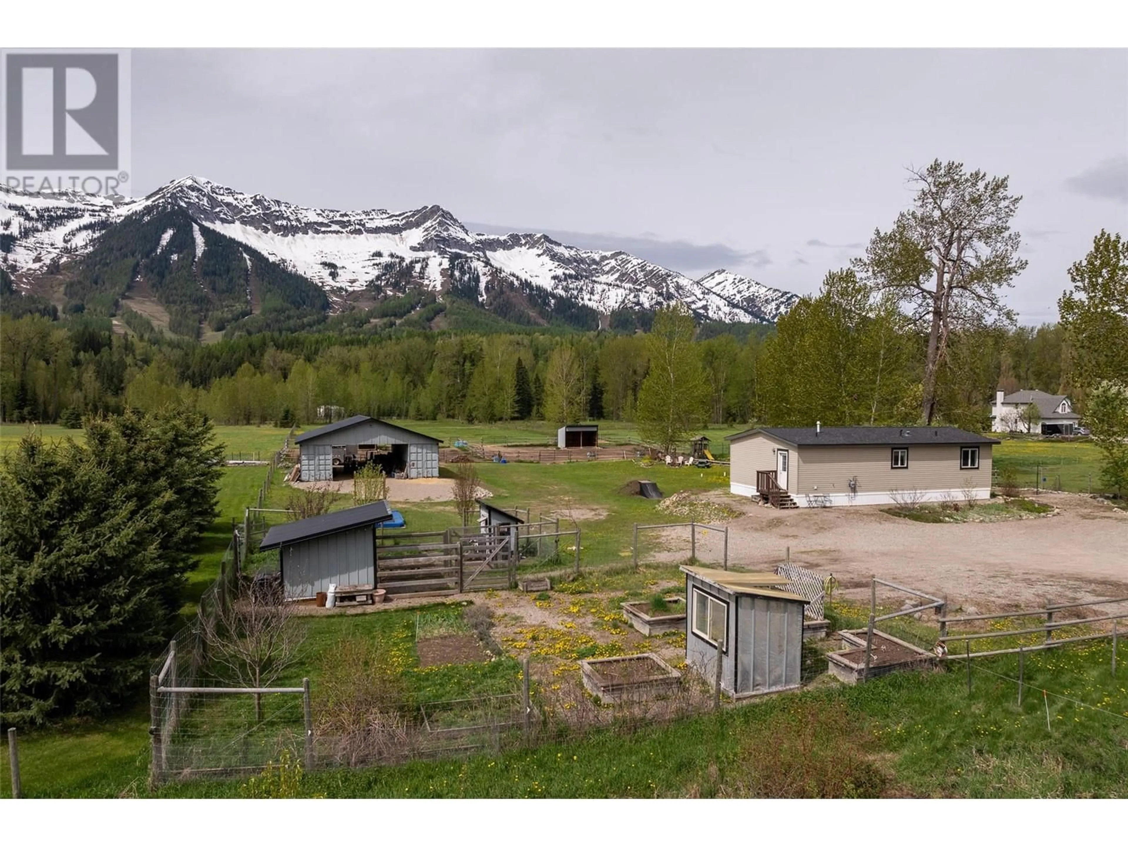 A pic from outside/outdoor area/front of a property/back of a property/a pic from drone, mountain view for 4103 HILL ROAD, Fernie British Columbia V0B1M4