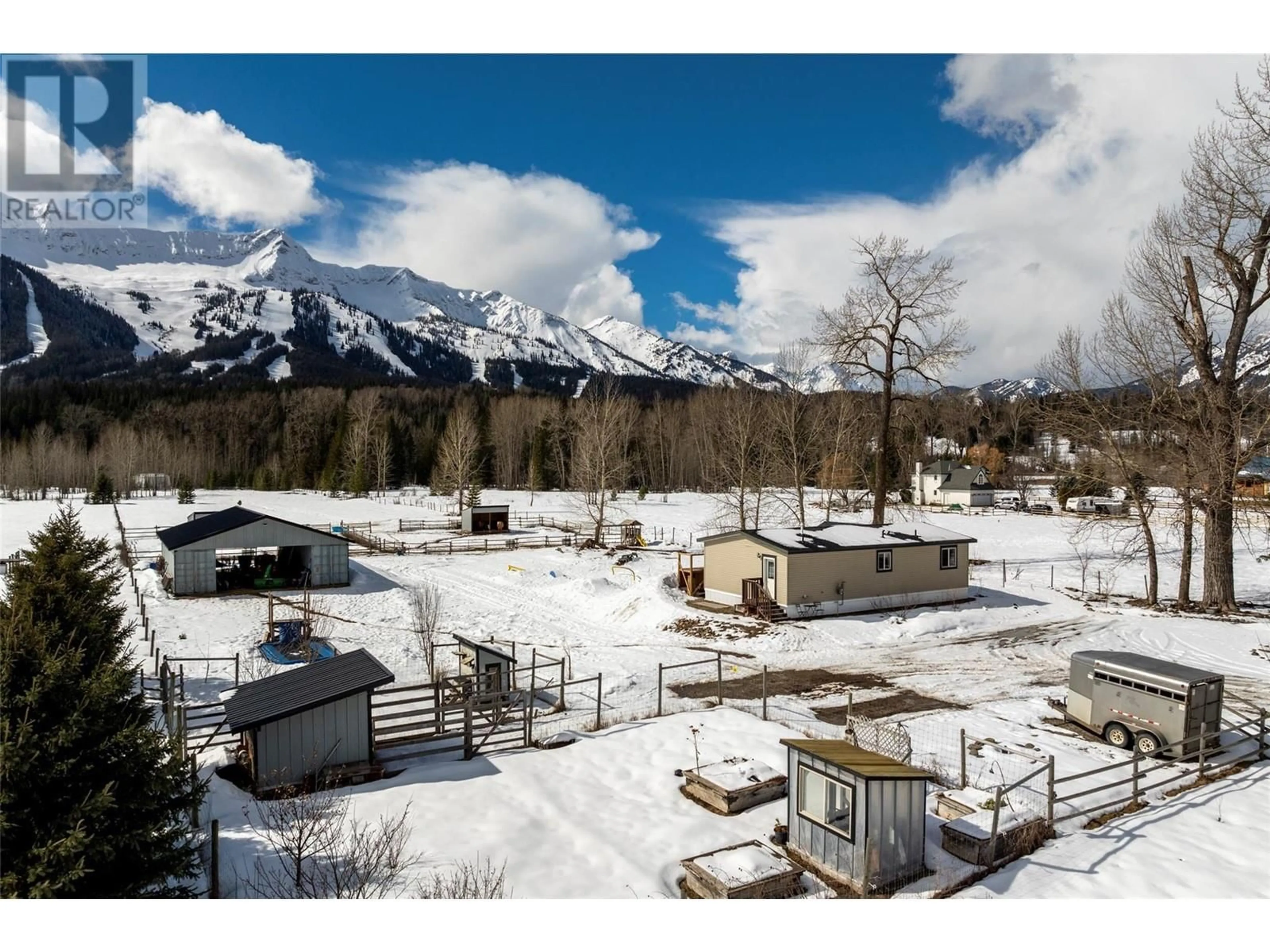 A pic from outside/outdoor area/front of a property/back of a property/a pic from drone, mountain view for 4103 HILL ROAD, Fernie British Columbia V0B1M4
