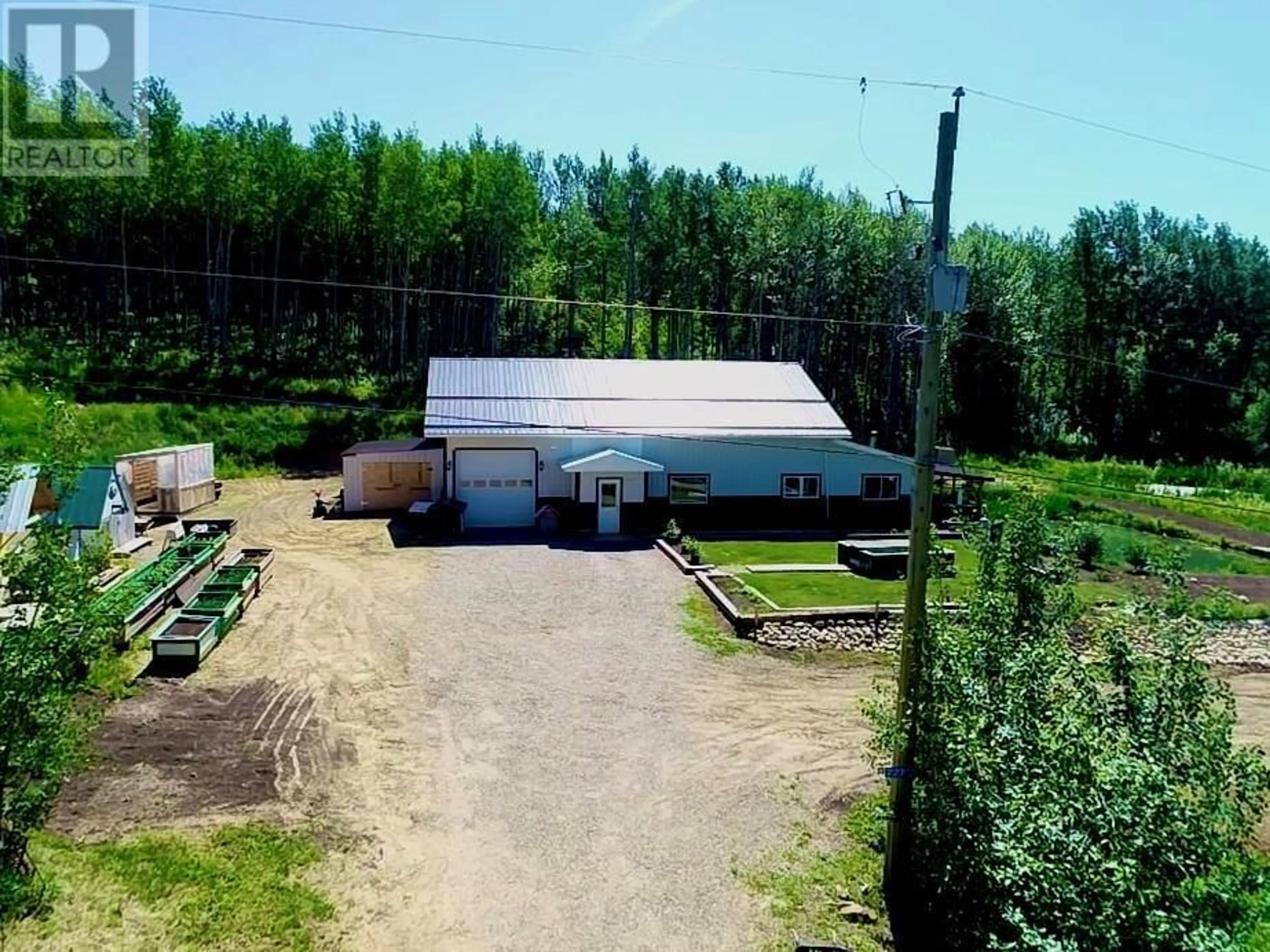 A pic from outside/outdoor area/front of a property/back of a property/a pic from drone, building for 227 PATTERSON ROAD, Dawson Creek British Columbia V0C2C0