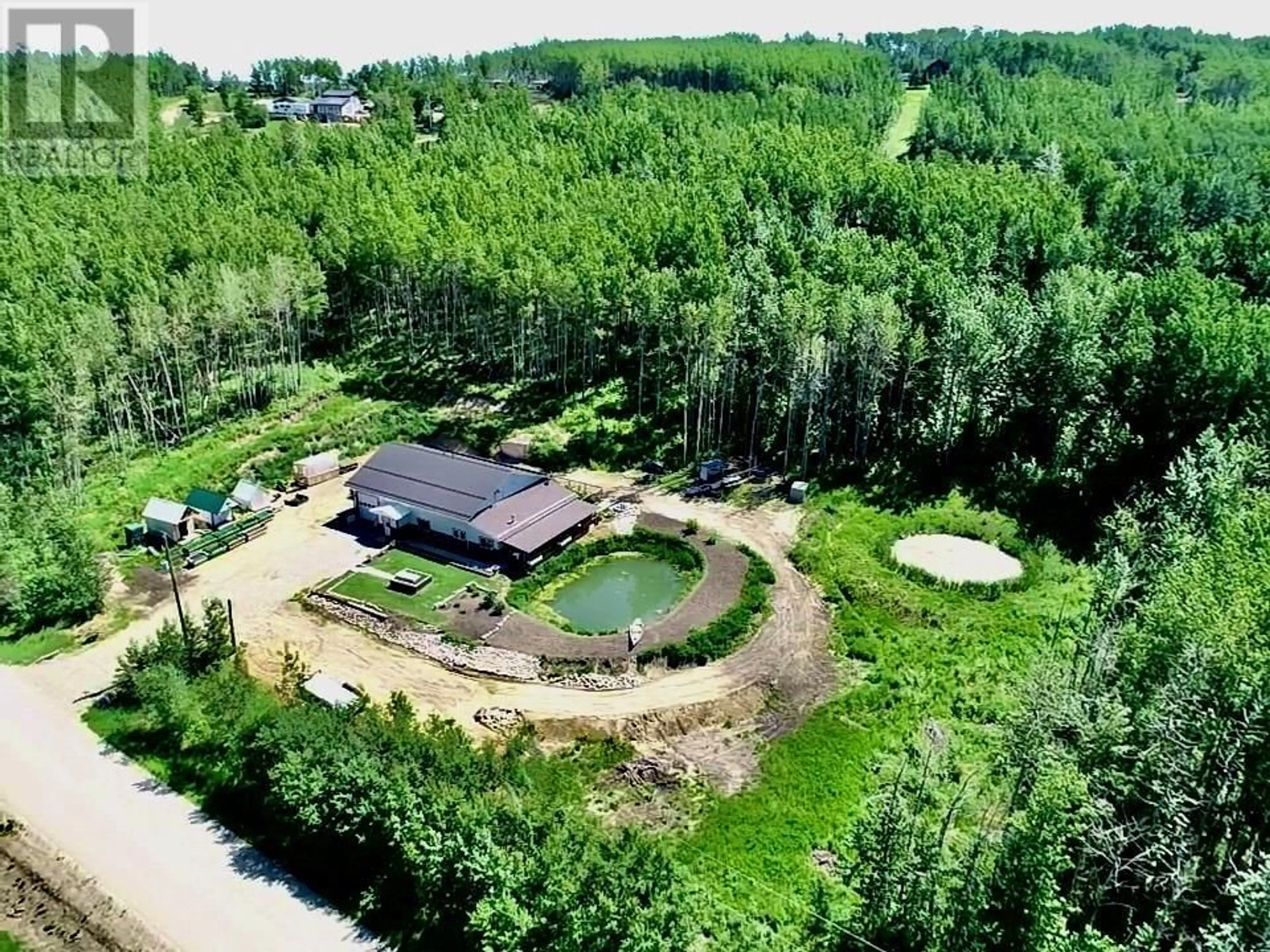 A pic from outside/outdoor area/front of a property/back of a property/a pic from drone, water/lake/river/ocean view for 227 PATTERSON ROAD, Dawson Creek British Columbia V0C2C0