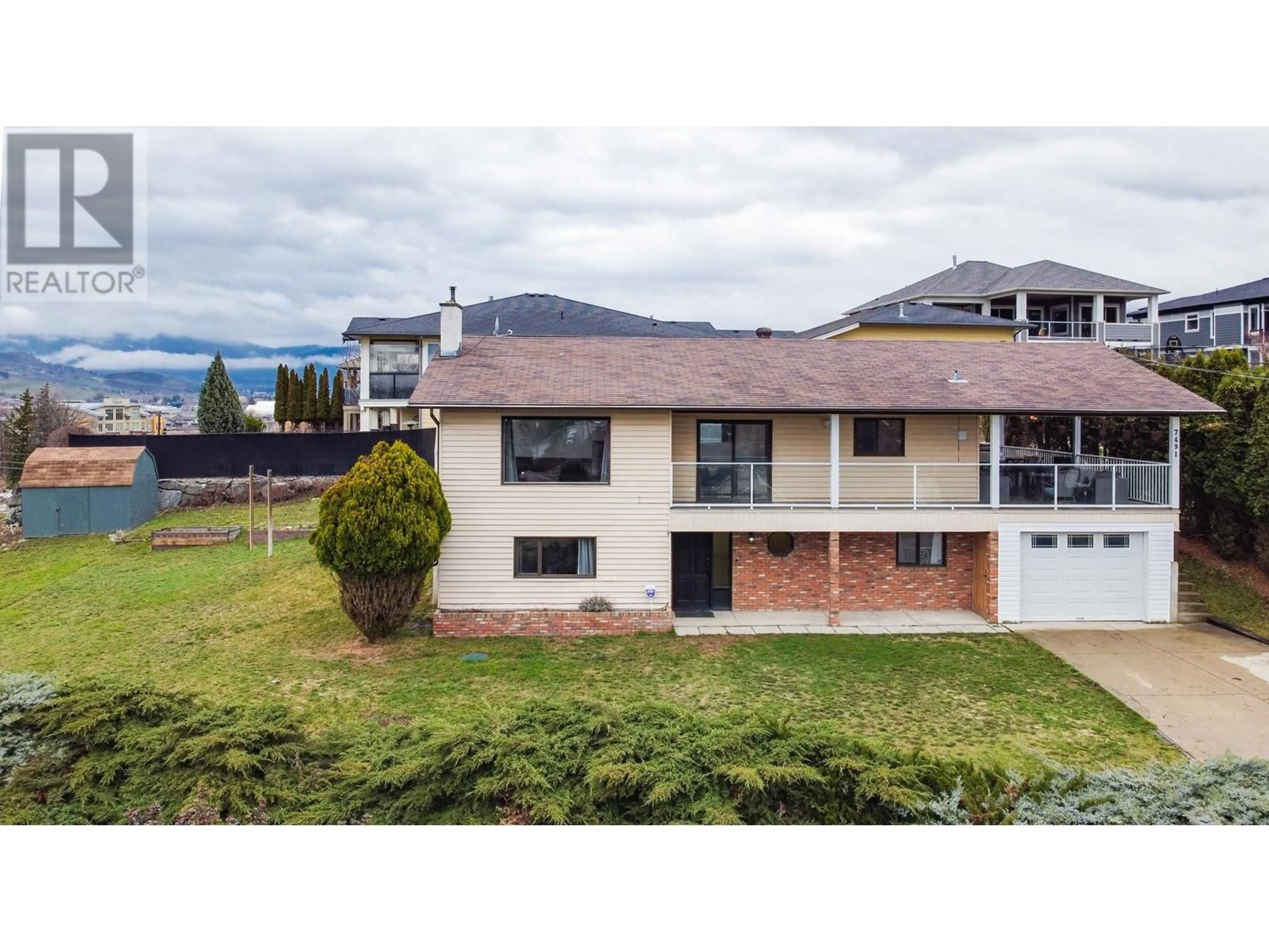 A pic from outside/outdoor area/front of a property/back of a property/a pic from drone, unknown for 7491 LONGACRE DRIVE, Vernon British Columbia V1H1G7