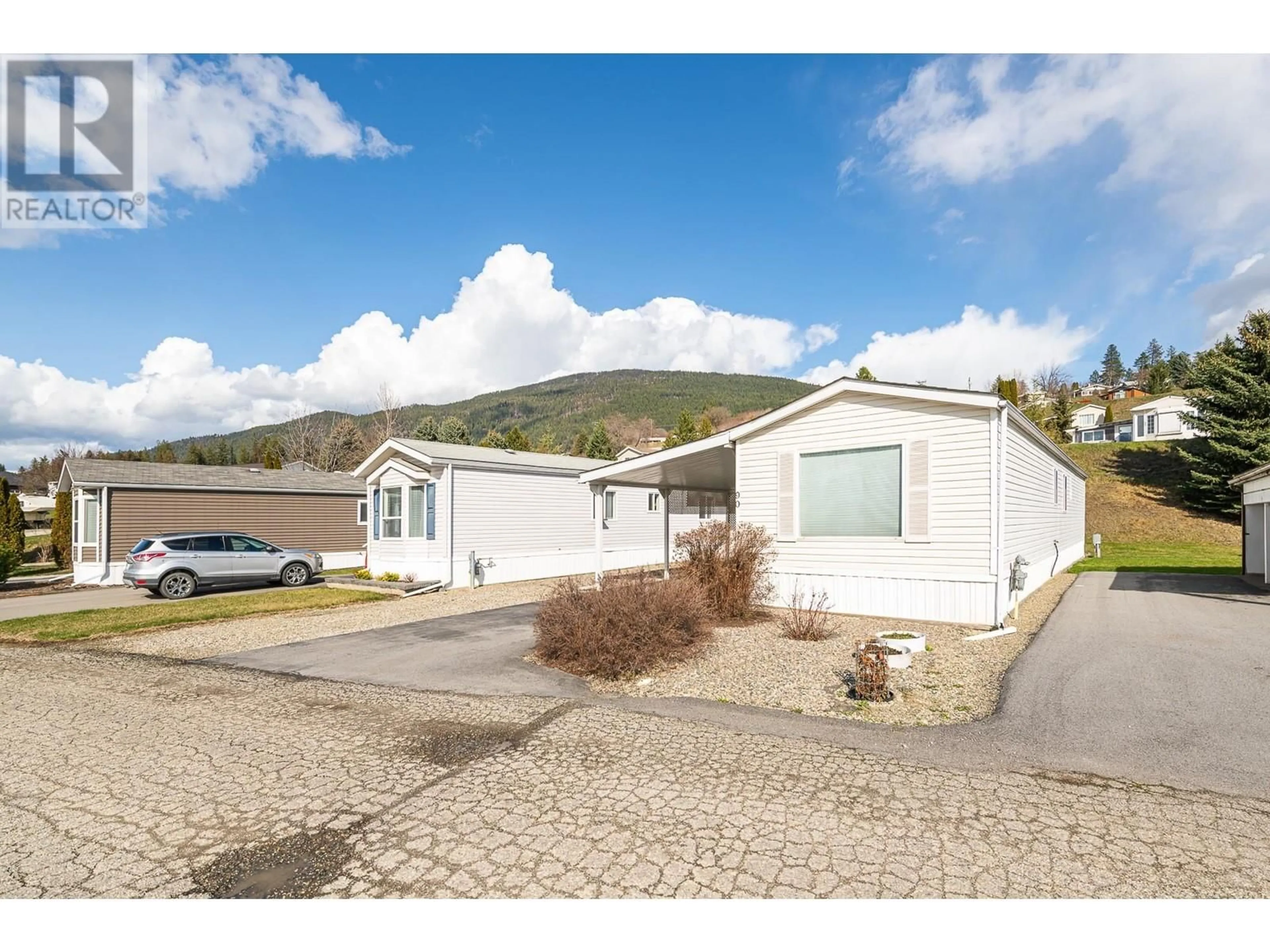A pic from outside/outdoor area/front of a property/back of a property/a pic from drone, street for 90 - 445 6TH AVENUE NORTH, Creston British Columbia V0B1G3
