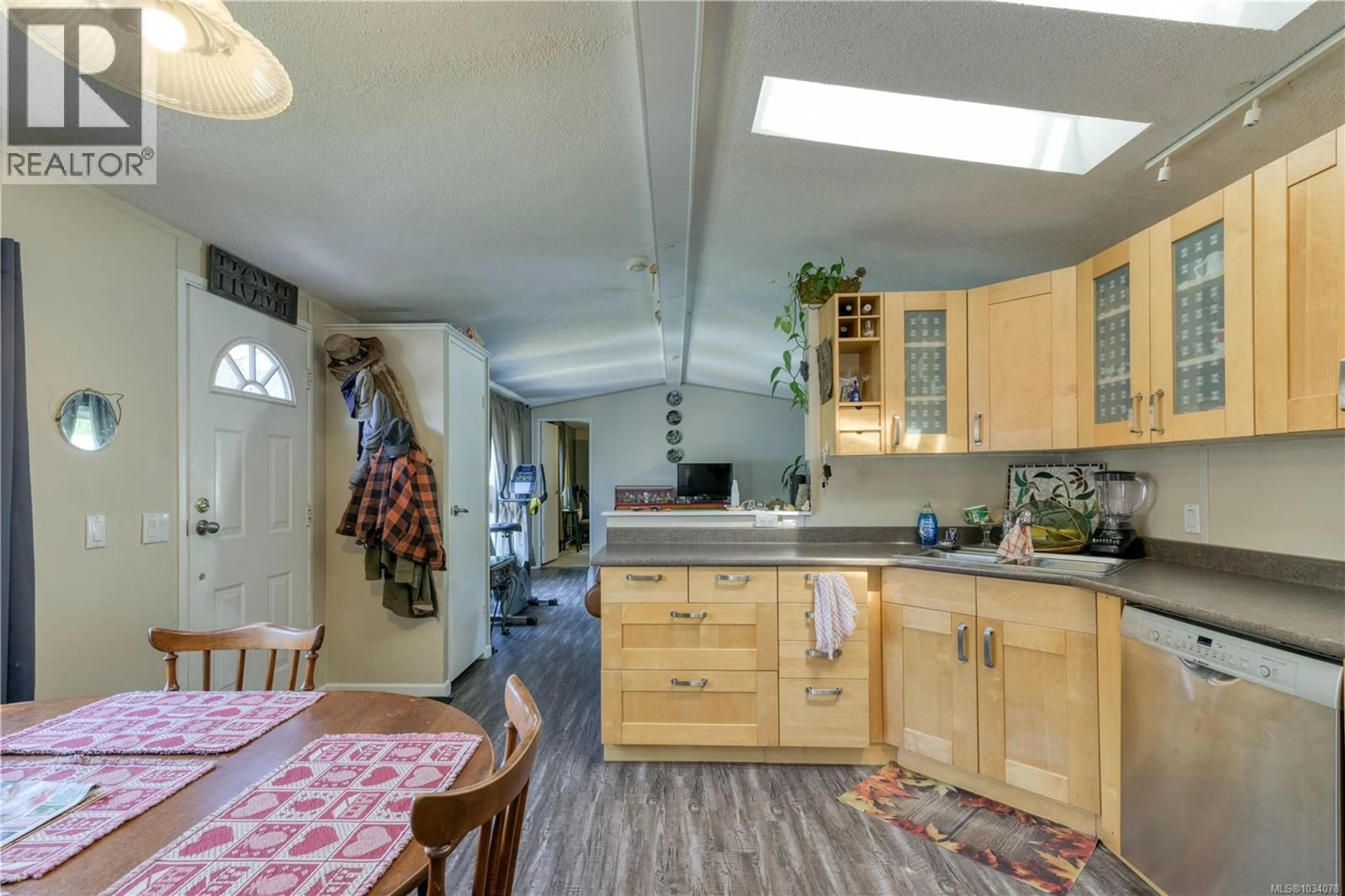 Open concept kitchen, ceramic/tile floor for 1 - 5250 BEAVER HARBOUR ROAD, Port Hardy British Columbia V0N2P0