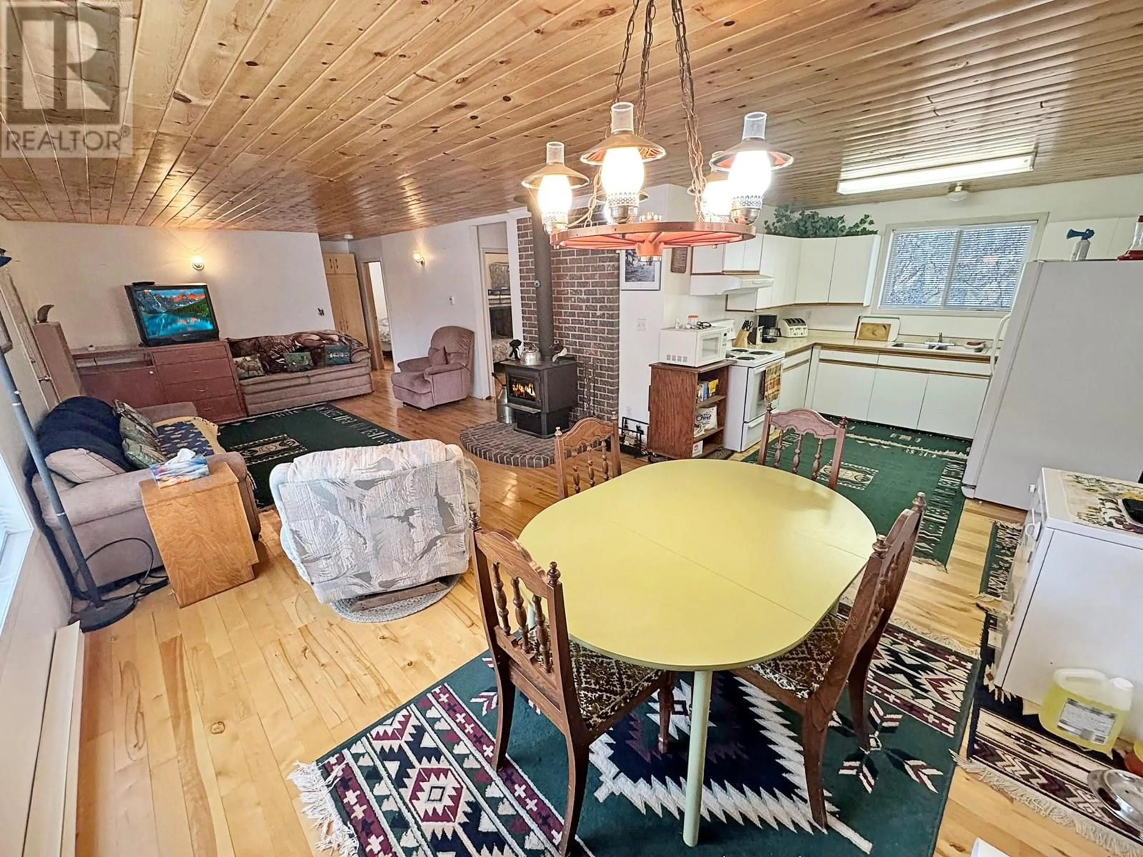 Dining room, wood/laminate floor for 4288 PRINCETON SUMMERLAND ROAD, Princeton British Columbia V0X1W0