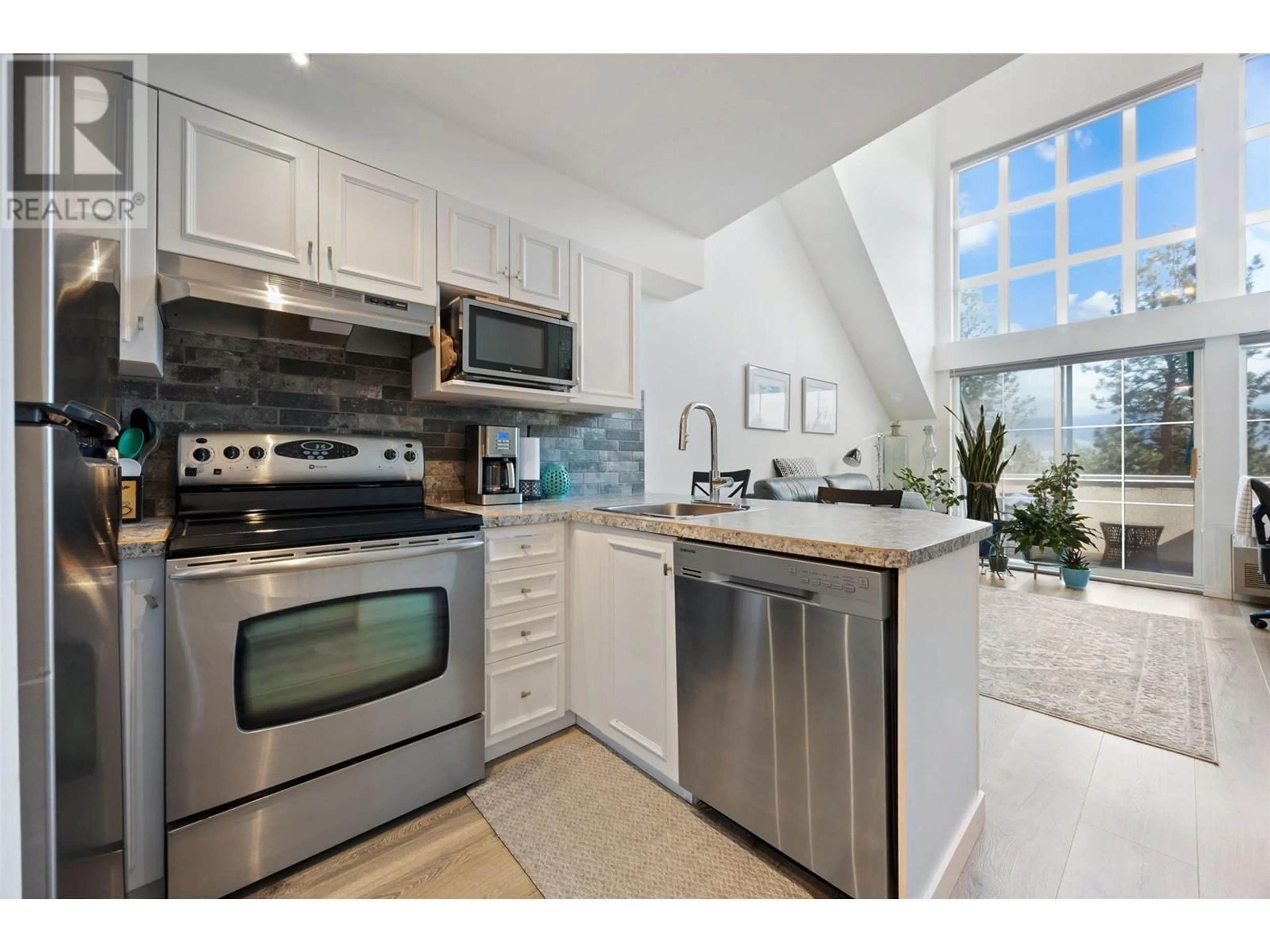 Standard kitchen, ceramic/tile floor for 302 - 3185 VIA CENTRALE OTHER, Kelowna British Columbia V1V2A7