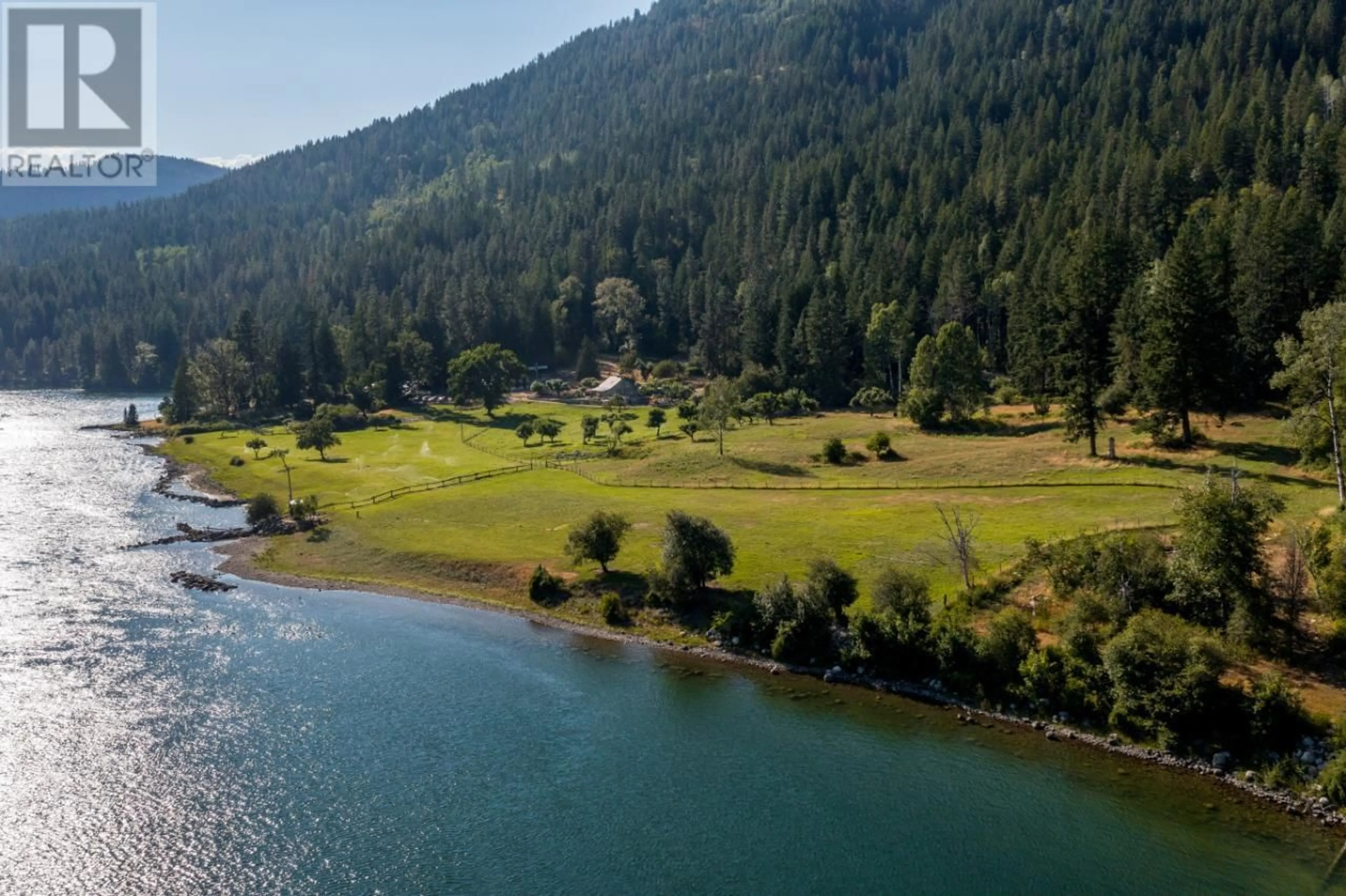 A pic from outside/outdoor area/front of a property/back of a property/a pic from drone, water/lake/river/ocean view for 6302 MARSDEN ROAD, Nelson British Columbia V1L6X9