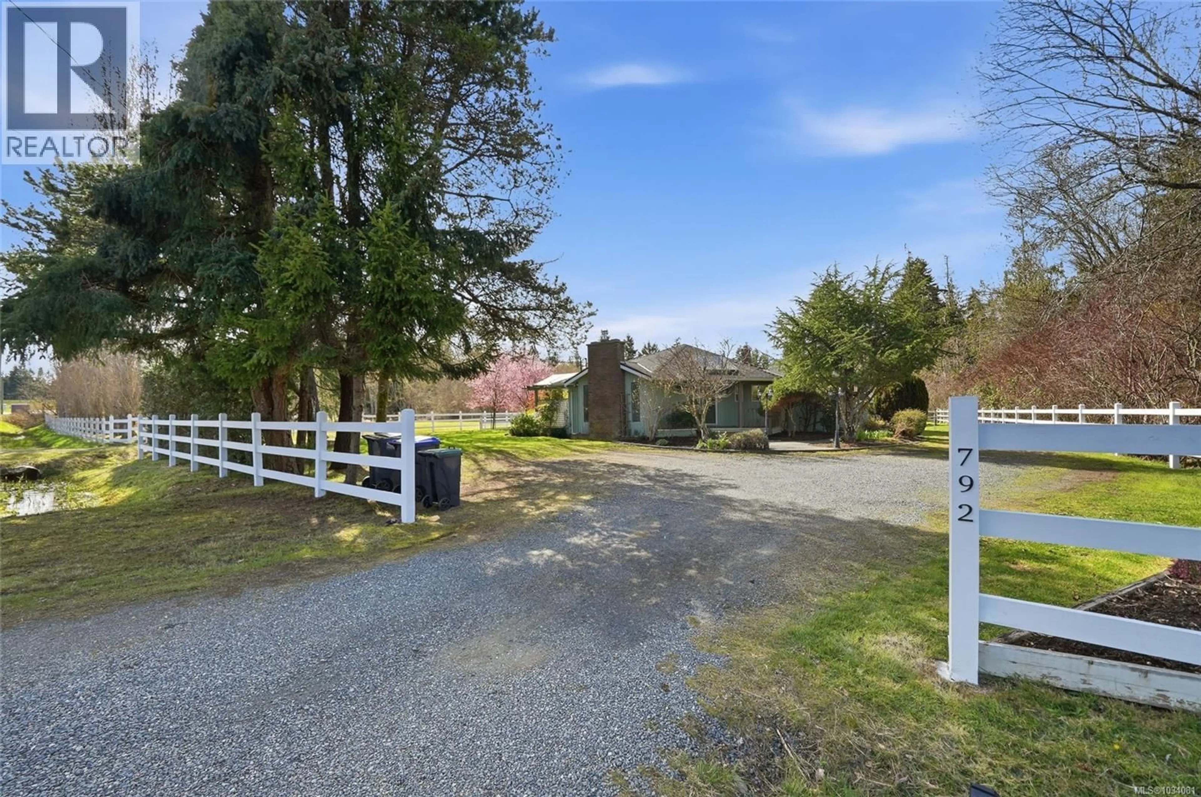 A pic from outside/outdoor area/front of a property/back of a property/a pic from drone, street for 792 BENNETT ROAD, Qualicum Beach British Columbia V9K1N1