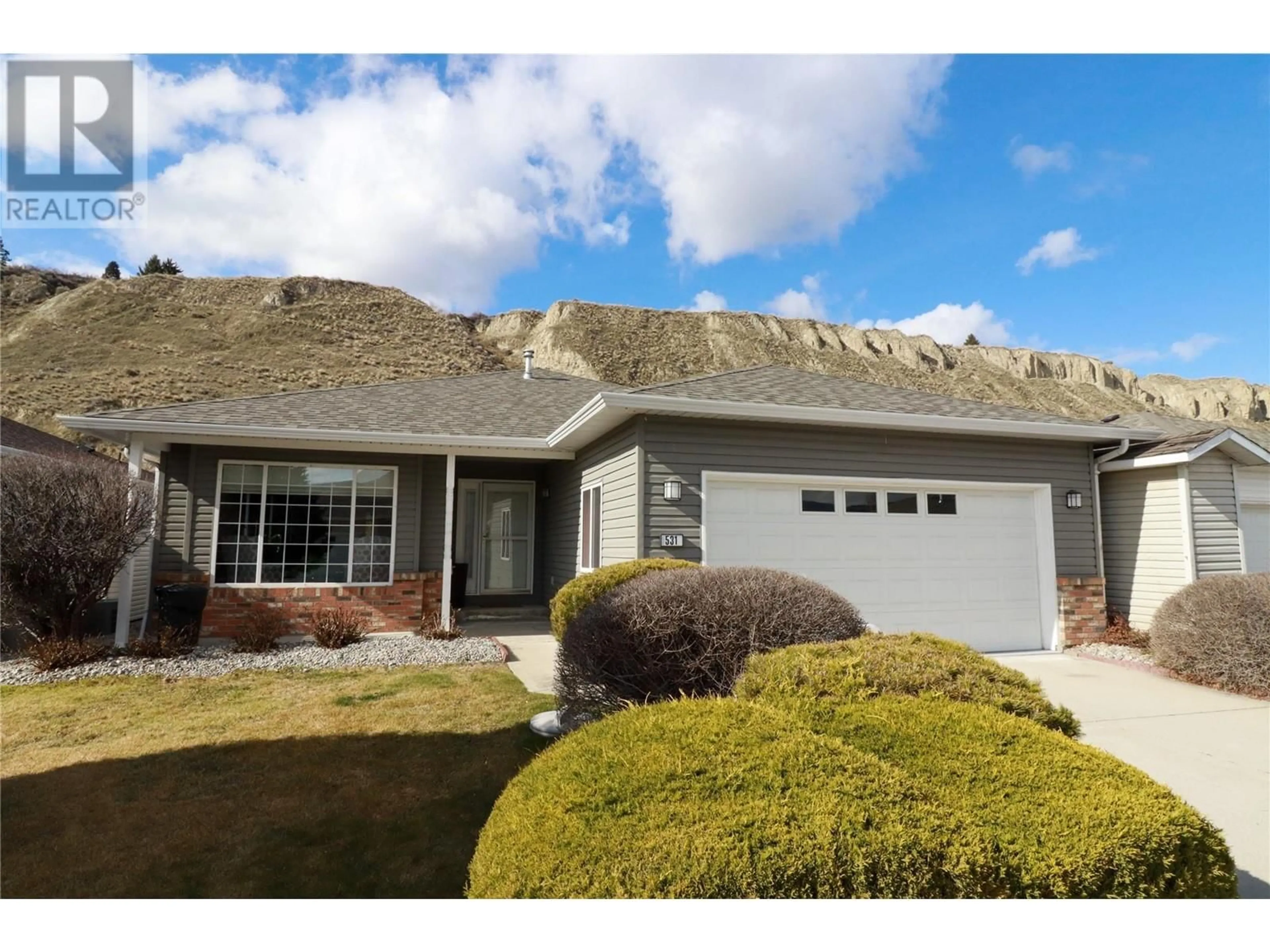 Home with vinyl exterior material, street for 531 RED WING DRIVE, Penticton British Columbia V2A7K8