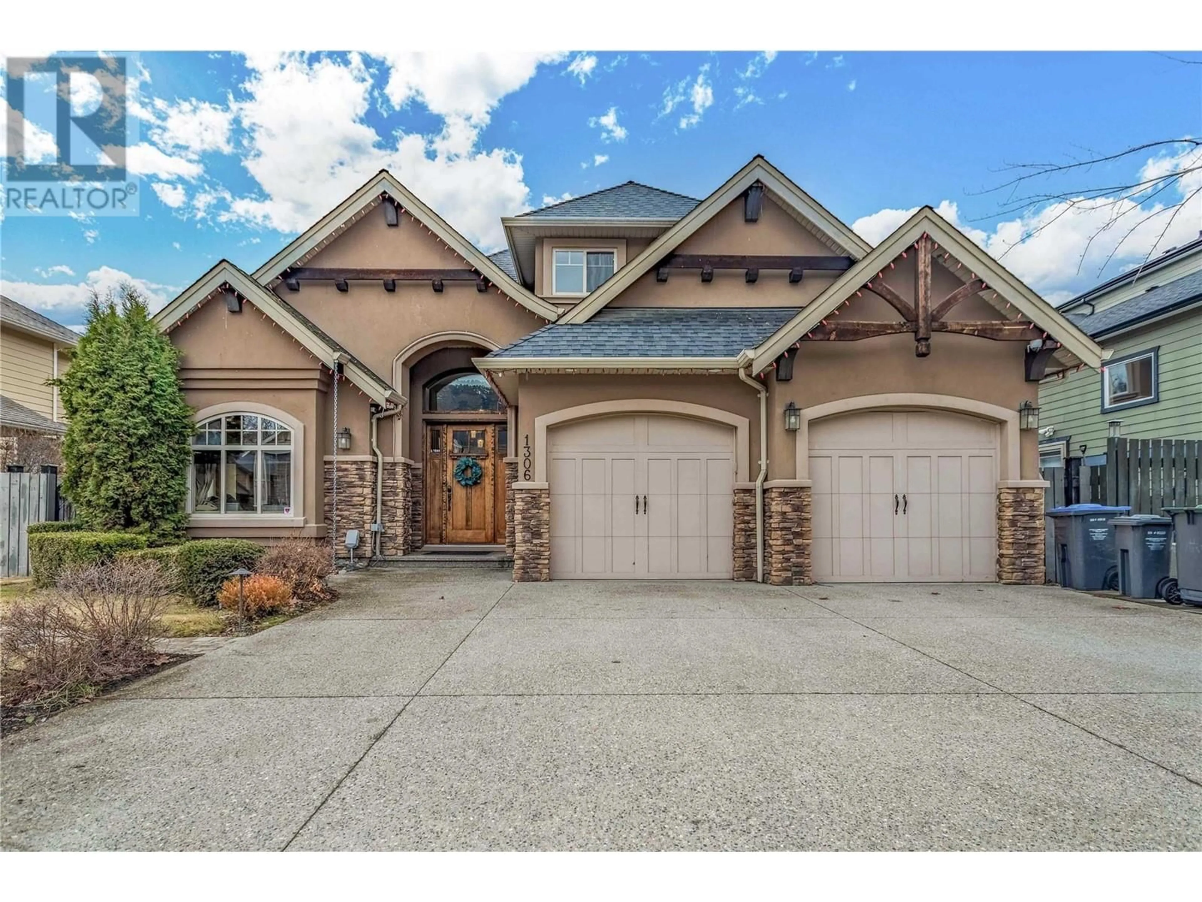 Home with brick exterior material, street for 1306 BLACK MOUNTAIN CRESCENT, Kelowna British Columbia V1P1P7